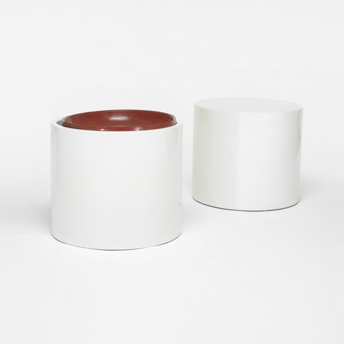 John Dickinson occasional tables, pair: John Dickinson occasional tables, pair USA, c. 1970 carved and lacquered wood 23.5 dia x 20.5 h inches One table features a tray insert; tray measures 20.25 dia inches. Provenance: Acquired directly f