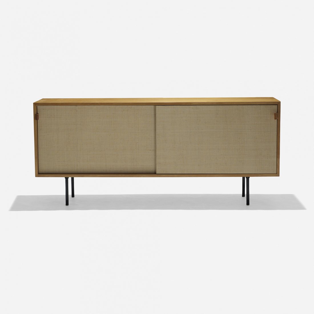 Florence Knoll cabinet, model 116: Florence Knoll cabinet, model 116 Knoll Associates USA, 1948 birch, grass cloth, oak, enameled steel, enameled brass, leather 72 w x 18 d x 31 h inches Cabinet features two sliding doors concealing se
