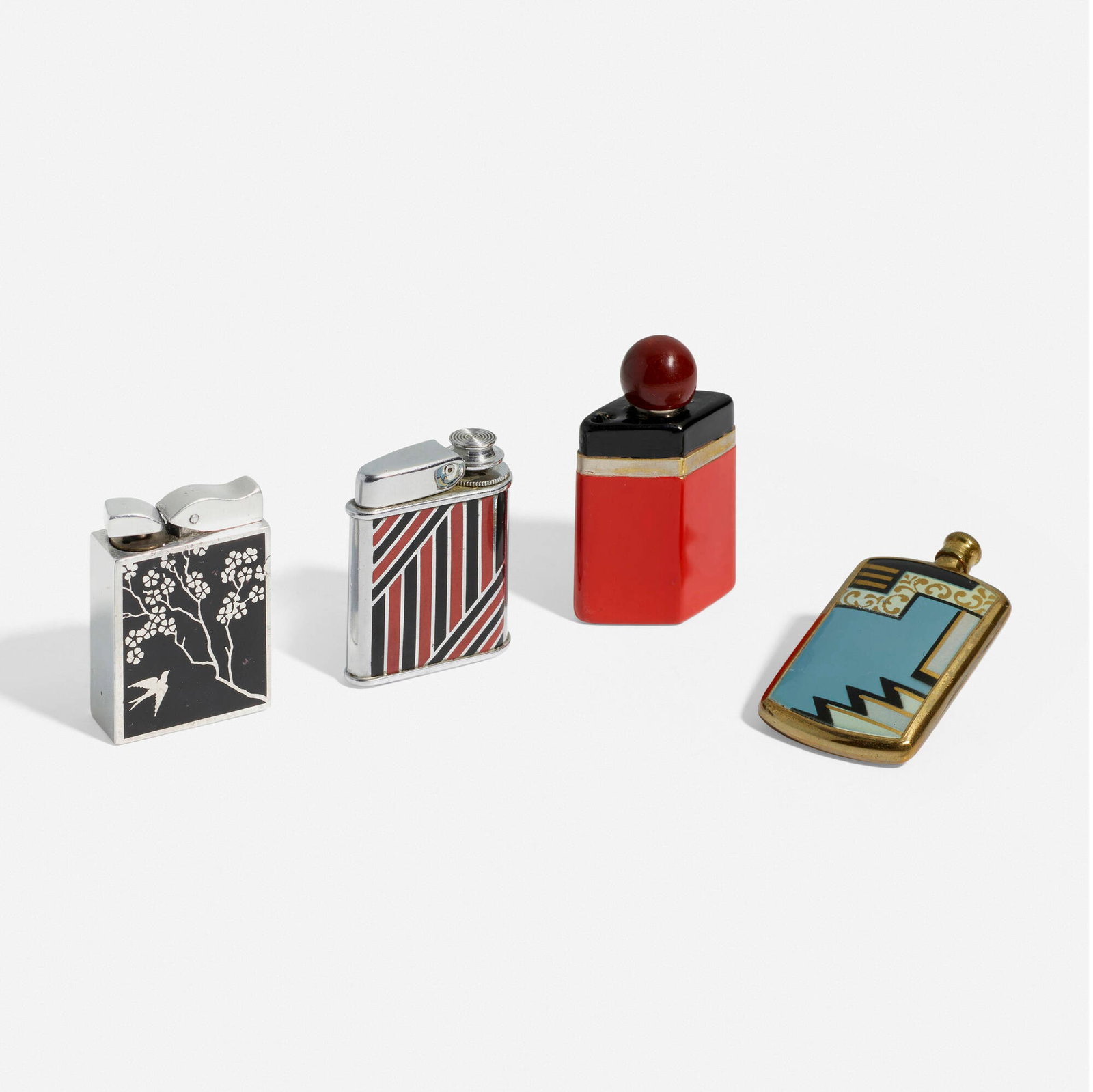 Perfume sprays, set of four: Perfume sprays, set of four c. 1930 enamel on aluminum, enamel on gilt metal, Bakelite largest: 2.25 h x 1.5 w x .75 d in (6 x 4 x 2 cm) smallest: 1.75 h x 1.5 w x .5 d in (4 x 4 x 1 cm) Lot includes 