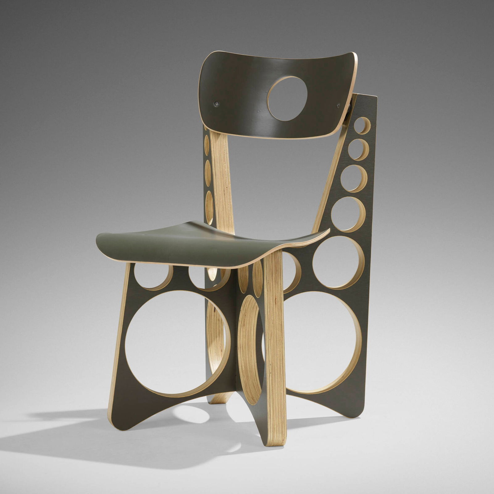 Tom Sachs, Shop chair (Olive Drab): Tom Sachs Shop chair (Olive Drab) USA, 2019lacquered maple and pine plywood, rubber, stainless steel 33.25 h x 18.75 w x 21 d in (84 x 48 x 53 cm) Metal manufacturer's label to leg 'Tom Sachs