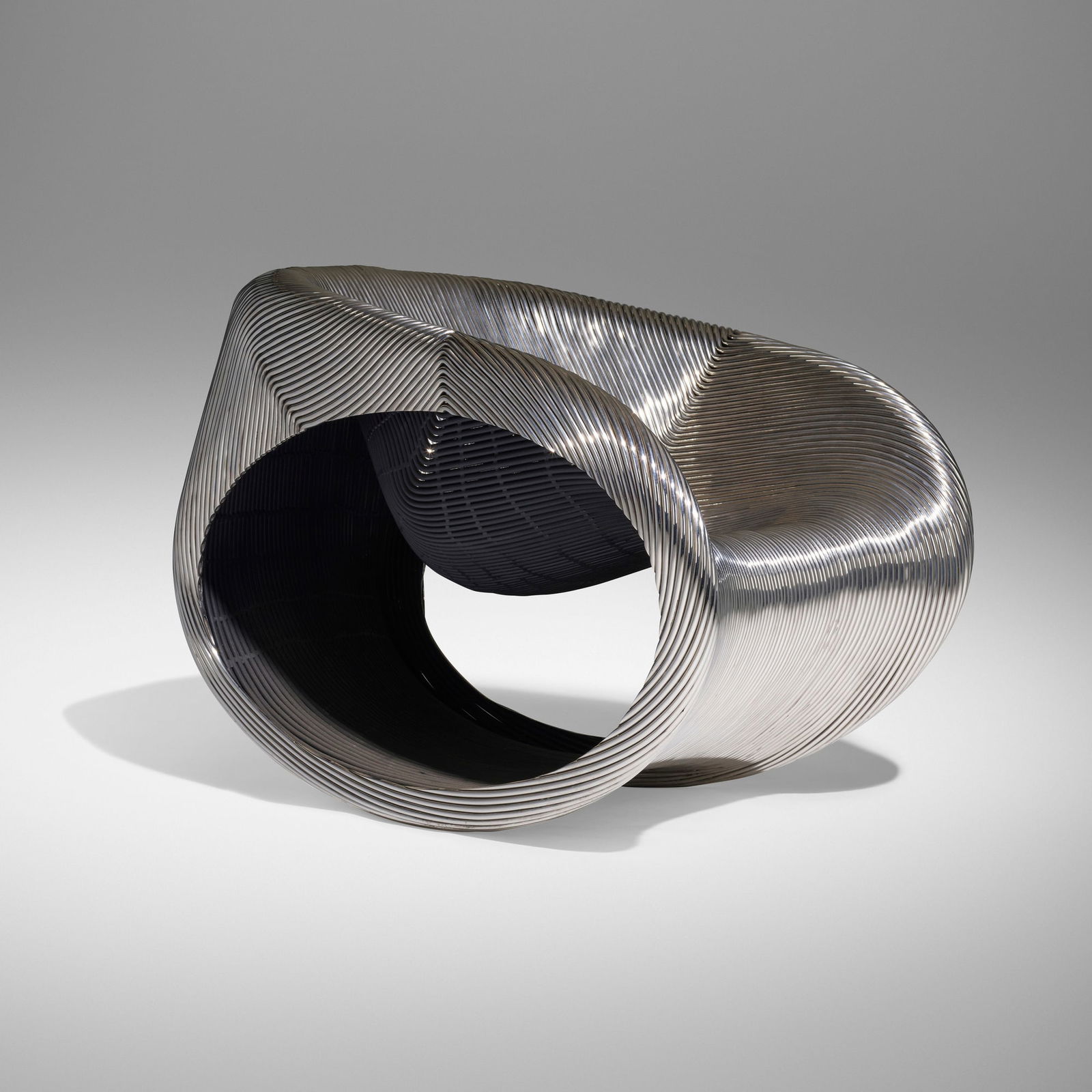 Ron Arad, MT rocker: Ron Arad MT rocker Ron Arad AssociatesUnited Kingdom, 2005polished stainless steel 31 h x 31 w x 40 d in (79 x 79 x 102 cm) Incised signature and number to side edge 'Ron Arad AP3'. This