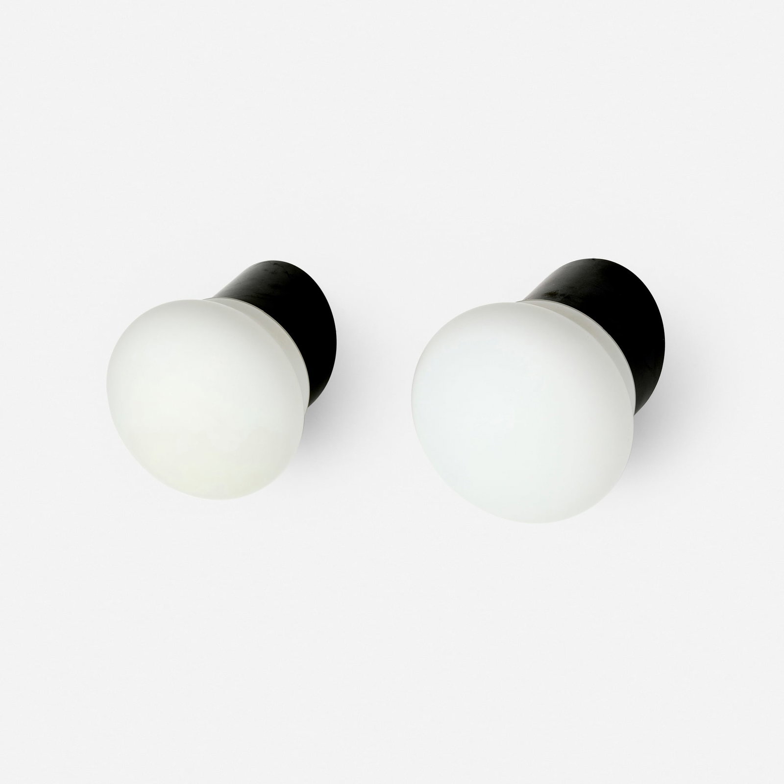 Selected by Charlotte Perriand, Sconces from Les Arcs, Savoie: Selected by Charlotte Perriand Sconces from Les Arcs, Savoie France, c. 1970 frosted glass, Bakelite 5.25 h x 5 w x 5.75 d in (13 x 13 x 15 cm) Perriand selected this design for use in the Les
