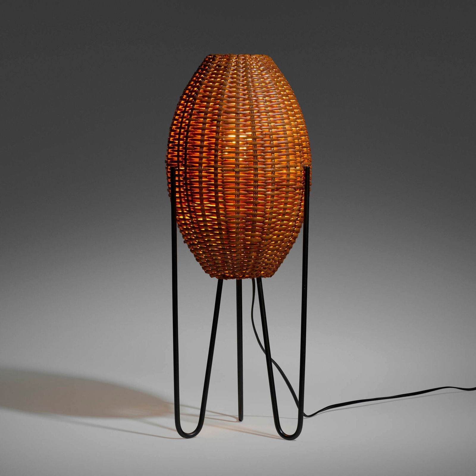 Paul Mayen, Table lamp: Paul Mayen Table lamp USA, c. 1965rattan, lacquered steel 26.25 h x 10.5 w x 9 d in (67 x 27 x 23 cm) This work will ship from Chicago, Illinois.