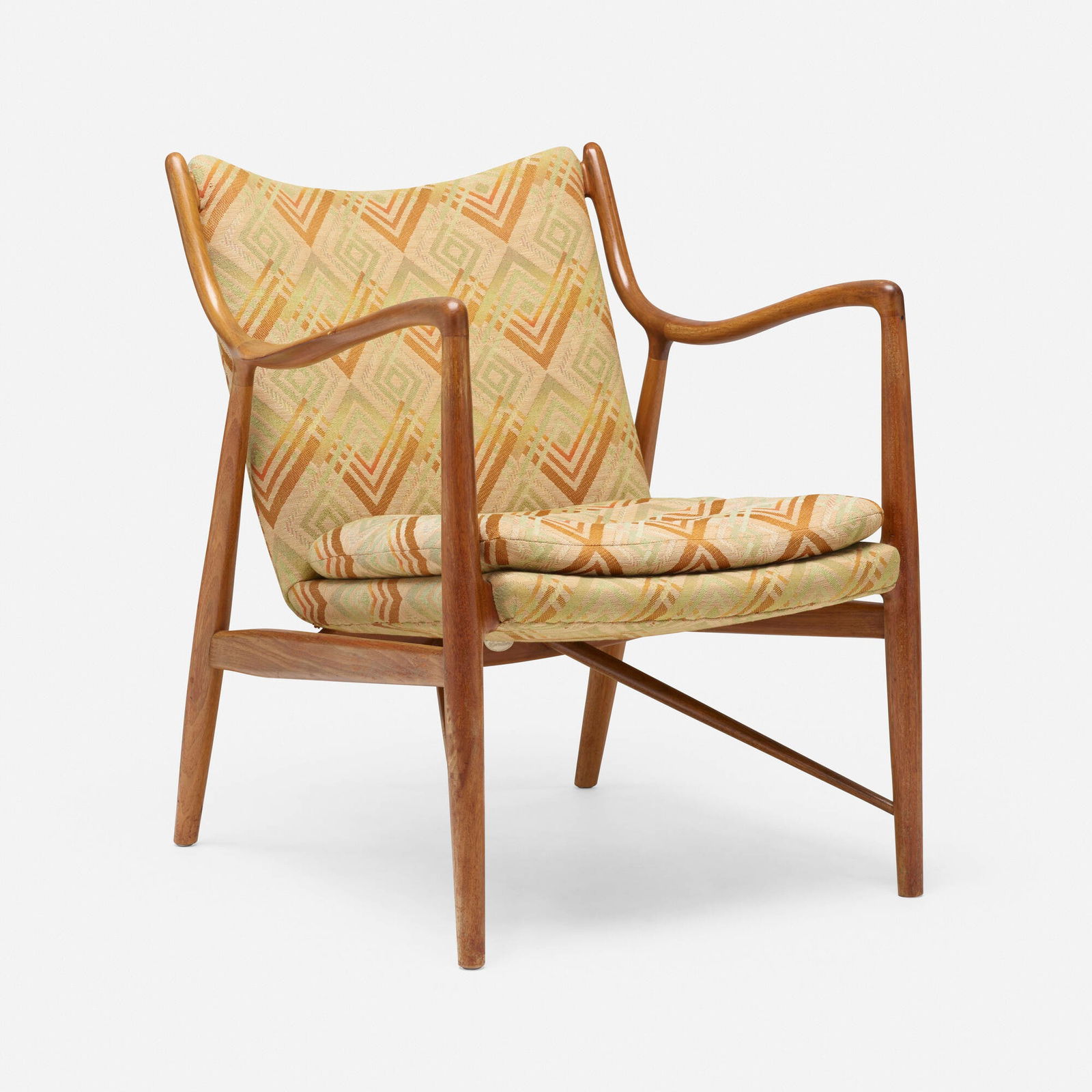 Finn Juhl, Lounge chair, model 409 1/2: Finn Juhl Lounge chair, model 409 1/2 Baker FurnitureDenmark / USA, 1945 / 1975walnut, fabric upholstery 32.75 h x 26.75 w x 29.5 d in (83 x 68 x 75 cm) Metal manufacturer's label to und