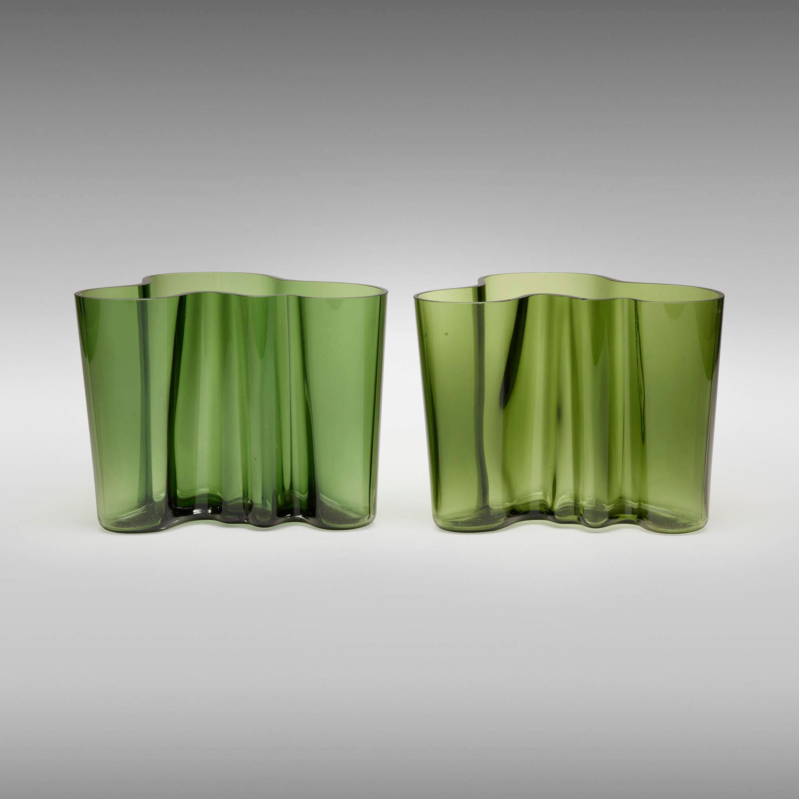 Alvar Aalto, Savoy vases model 3030, pair: Alvar Aalto Savoy vases model 3030, pair IittalaFinland, 1936 / c. 1986glass 6.25 h x 8 w x 7 d in (16 x 20 x 18 cm) Etched signature, date and number to one example 'A. Aalto 1936-1986