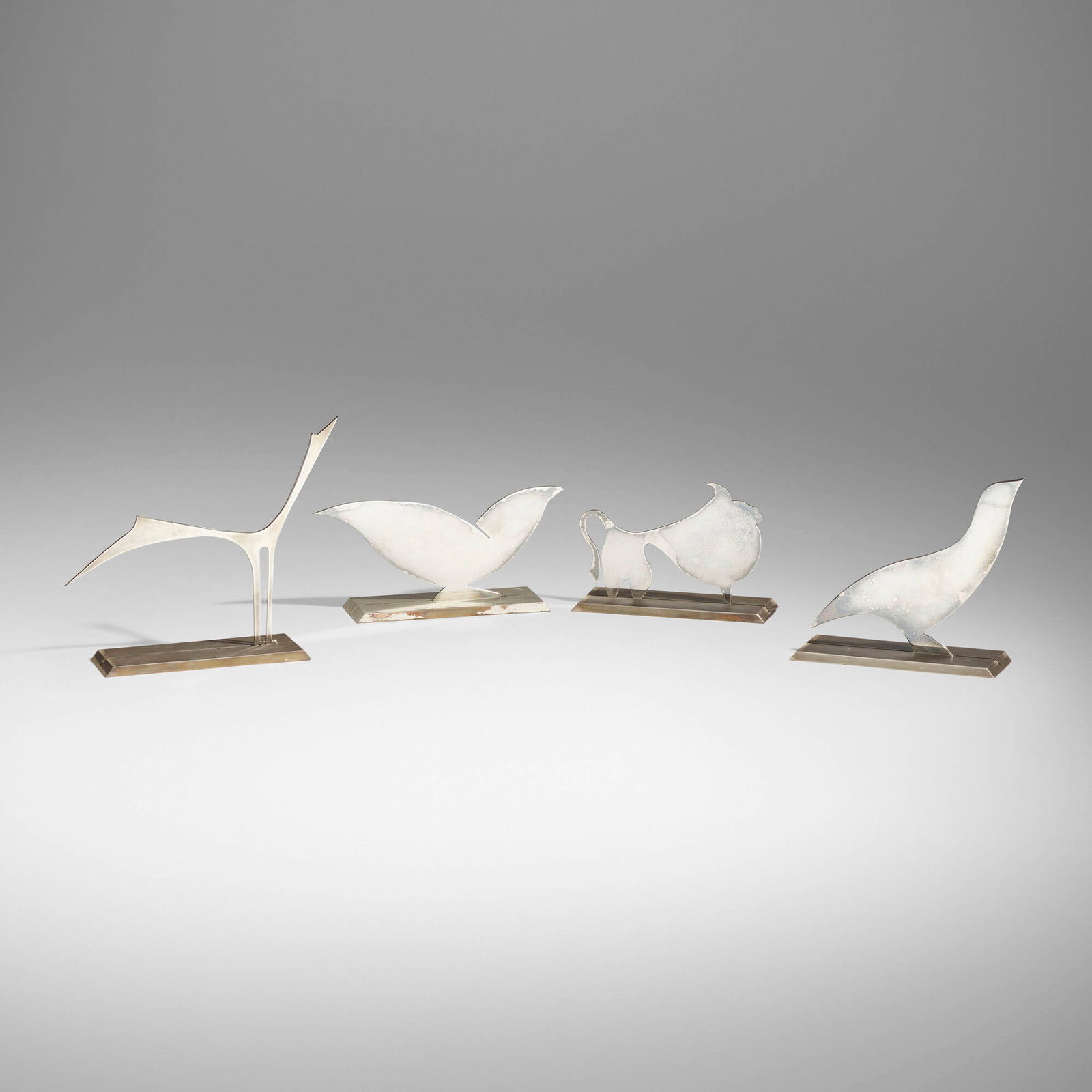 Lino Sabattini, Collection of four animal figures: Lino Sabattini Collection of four animal figures Italy, c. 1985silver-plated brass largest: 6.5 h x 5.5 w x 2 d in (17 x 14 x 5 cm) smallest: Collection includes Toro Mitologico,