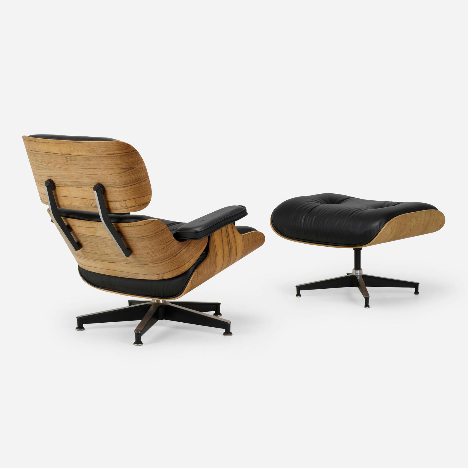 Charles and Ray Eames, 670 lounge chair and 671 ottoman: Charles and Ray Eames 670 lounge chair and 671 ottoman Herman Miller USA, 1956 / c. 1970 rosewood, leather, enameled and brushed aluminum 32 h x 33.75 w x 29 d in (81 x 86 x 74 cm) 16.5 h x 26
