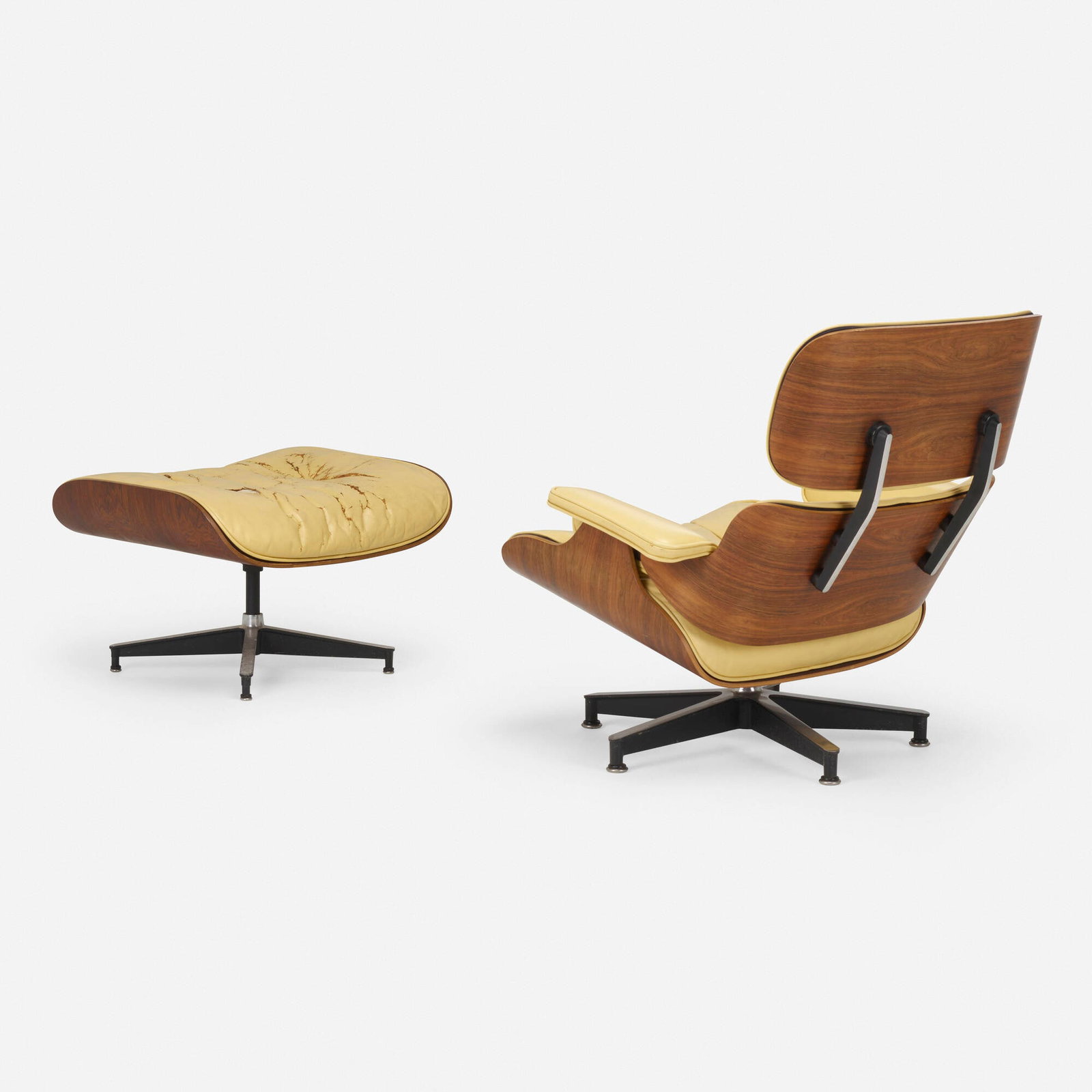Charles and Ray Eames, 670 lounge chair and 671 ottoman: Charles and Ray Eames 670 lounge chair and 671 ottoman Herman Miller USA, 1956 / c. 1960 rosewood, leather, enameled and brushed aluminum, rubber chair: 32 h x 33.75 w x 29 d in (81 x 86 x 74 cm)
