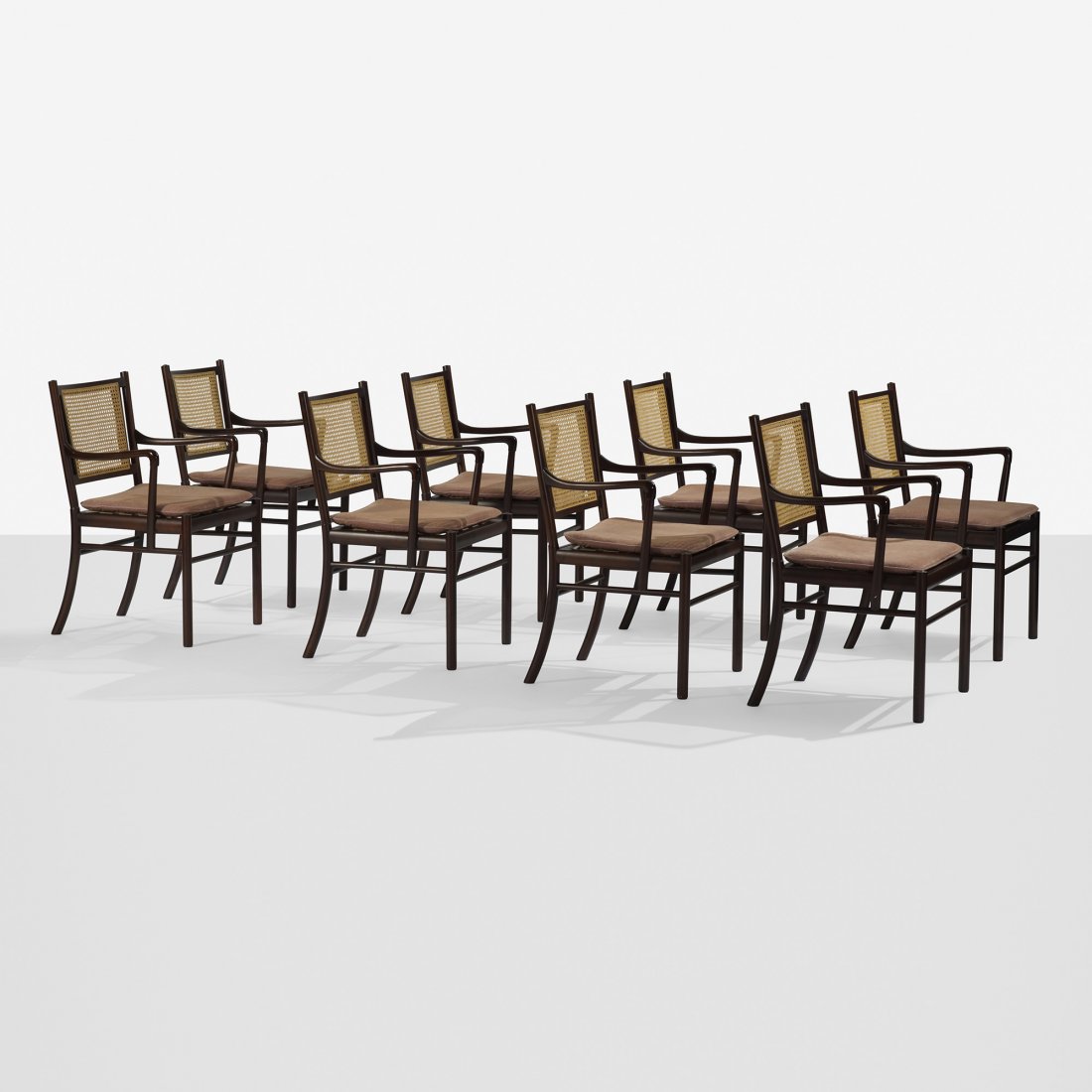 Ole Wanscher dining chairs, set of eight: Ole Wanscher dining chairs, set of eight Poul Jeppesen Denmark, c. 1960 mahogany, upholstery, cane 23 w x 22 d x 33.5 h inches Signed with applied foil manufacturer's label to underside: [P. Jeppesen 
