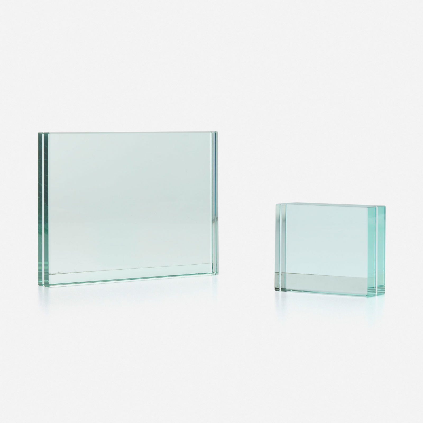 Fontana Arte, Picture frames, set of two: Fontana Arte Picture frames, set of two Italy, c. 1960glass 5.5 h × 7.125 w × 1 d in (14 × 18 × 3 cm) 3 h × 3.625 w × 1.25 d in (8 × 9 × 3 cm)