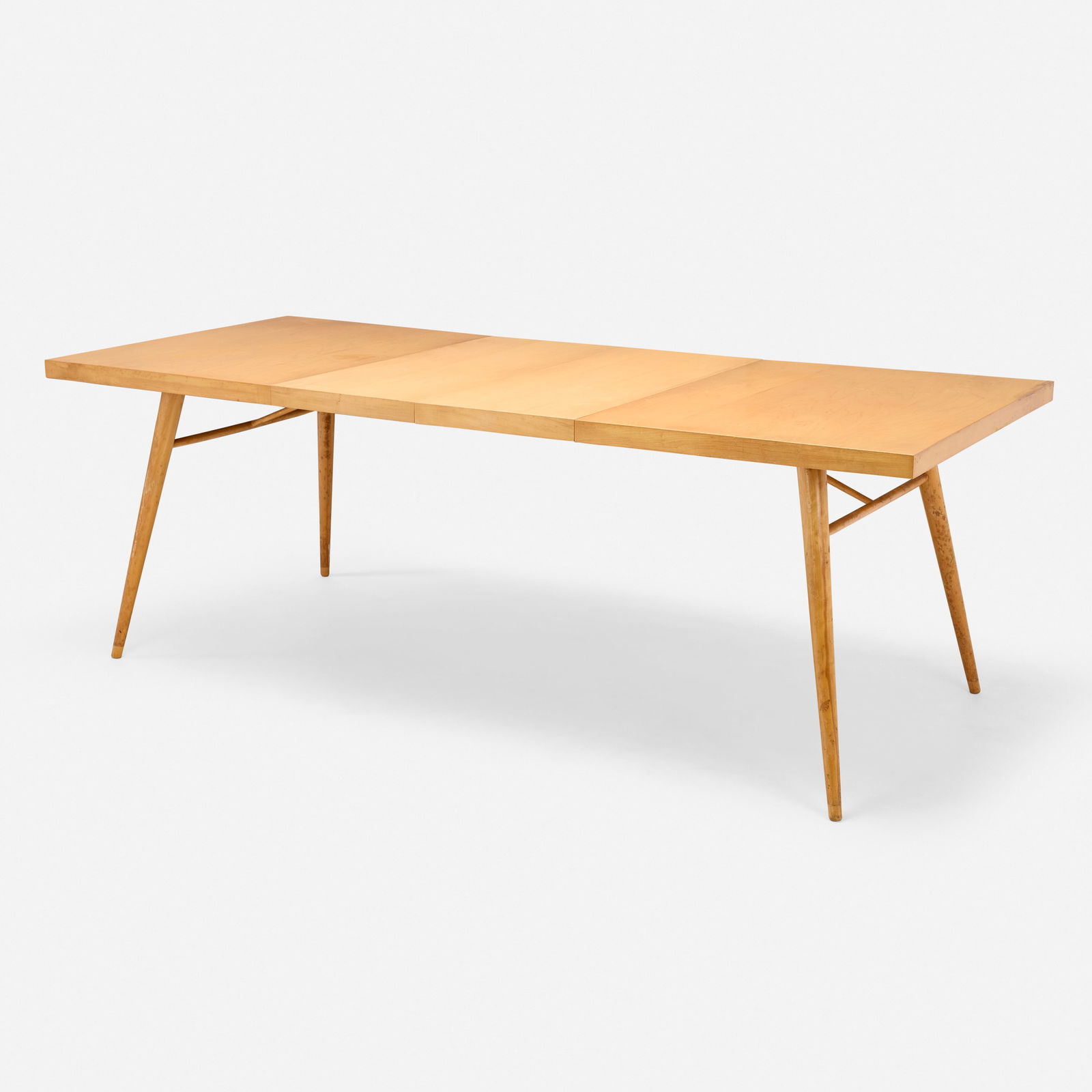 Paul McCobb, Planner Group dining table, model 1522: Paul McCobb Planner Group dining table, model 1522 WinchendonUSA, c. 1950maple 29 h × 54 w × 36 d in (74 × 137 × 91 cm) Sold with two 15-inch leaves; table mea
