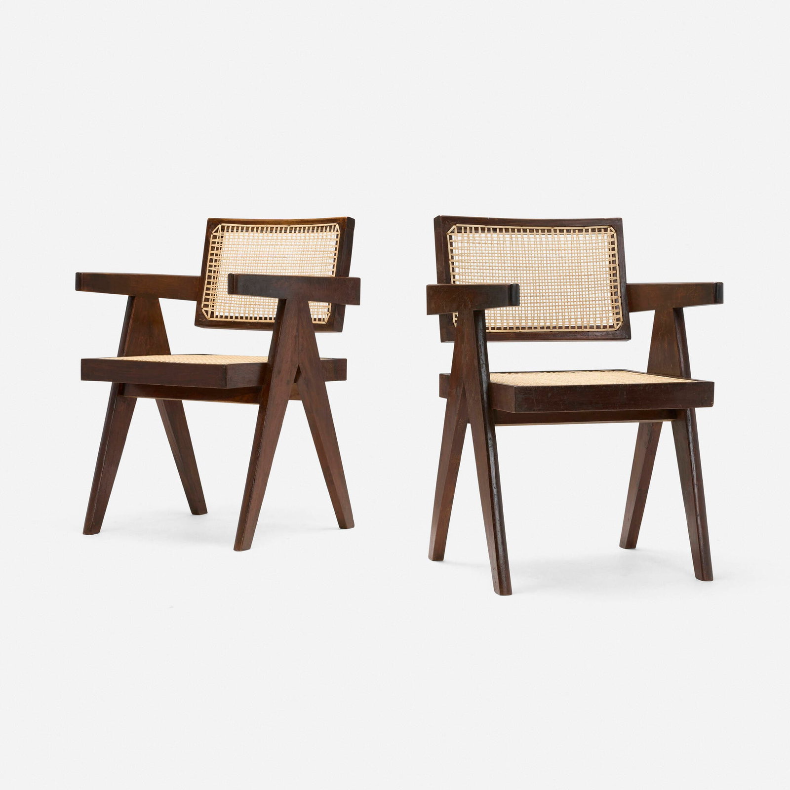 Pierre Jeanneret, Office Cane chairs from Chandigarh, pair: Pierre Jeanneret Office Cane chairs from Chandigarh, pair France/India, c. 1960 teak, cane, upholstery 31.5 h x 20 w x 20.75 d in (80 x 51 x 53 cm) Stenciled marks to each example.