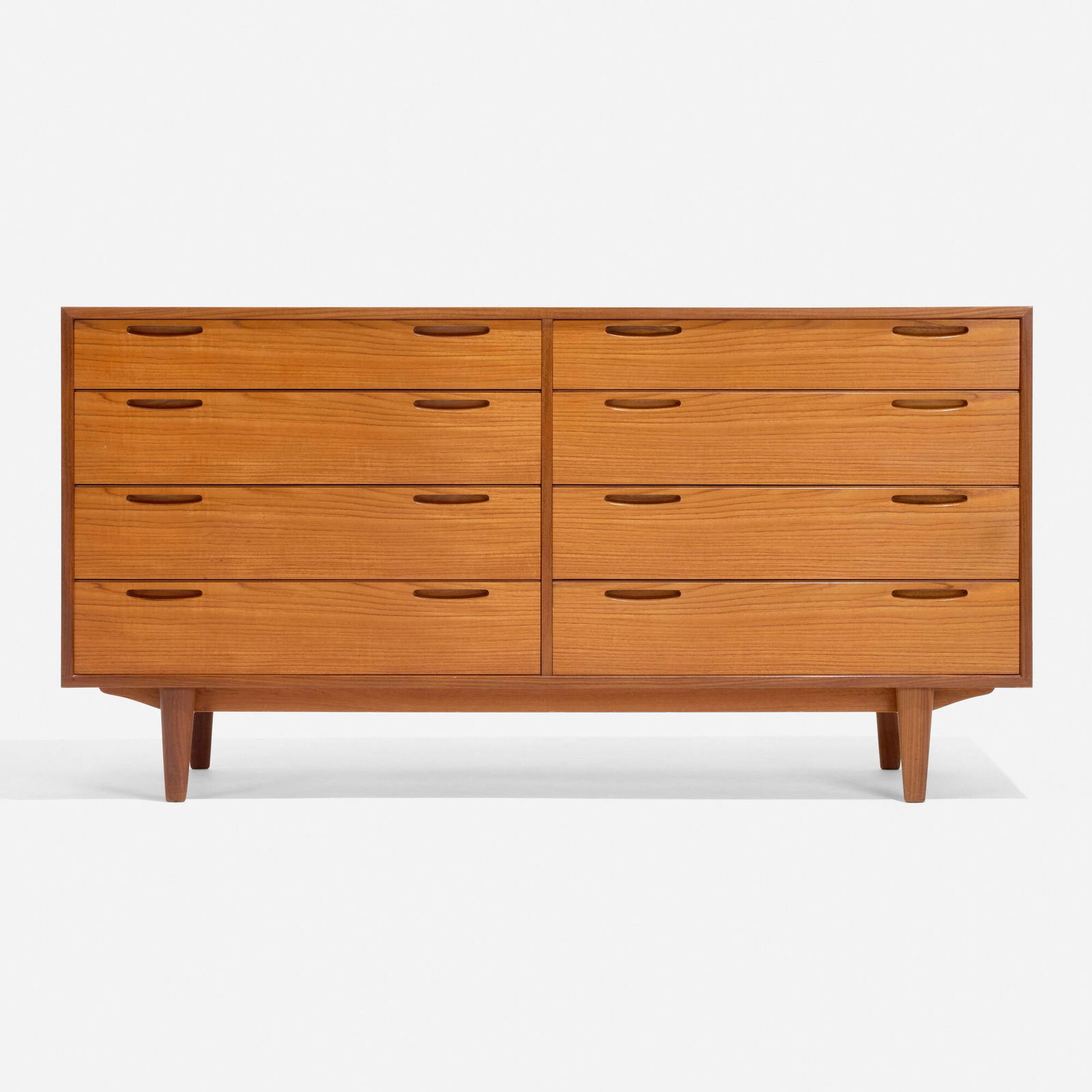 Ib Kofod-Larsen, Cabinet: Ib Kofod-Larsen Cabinet Brande MobelfabrikDenmark, c. 1955teak 30.25 h x 59 w x 17.75 d in (77 x 150 x 45 cm) Cabinet features eight drawers. Provenance: Illums B
