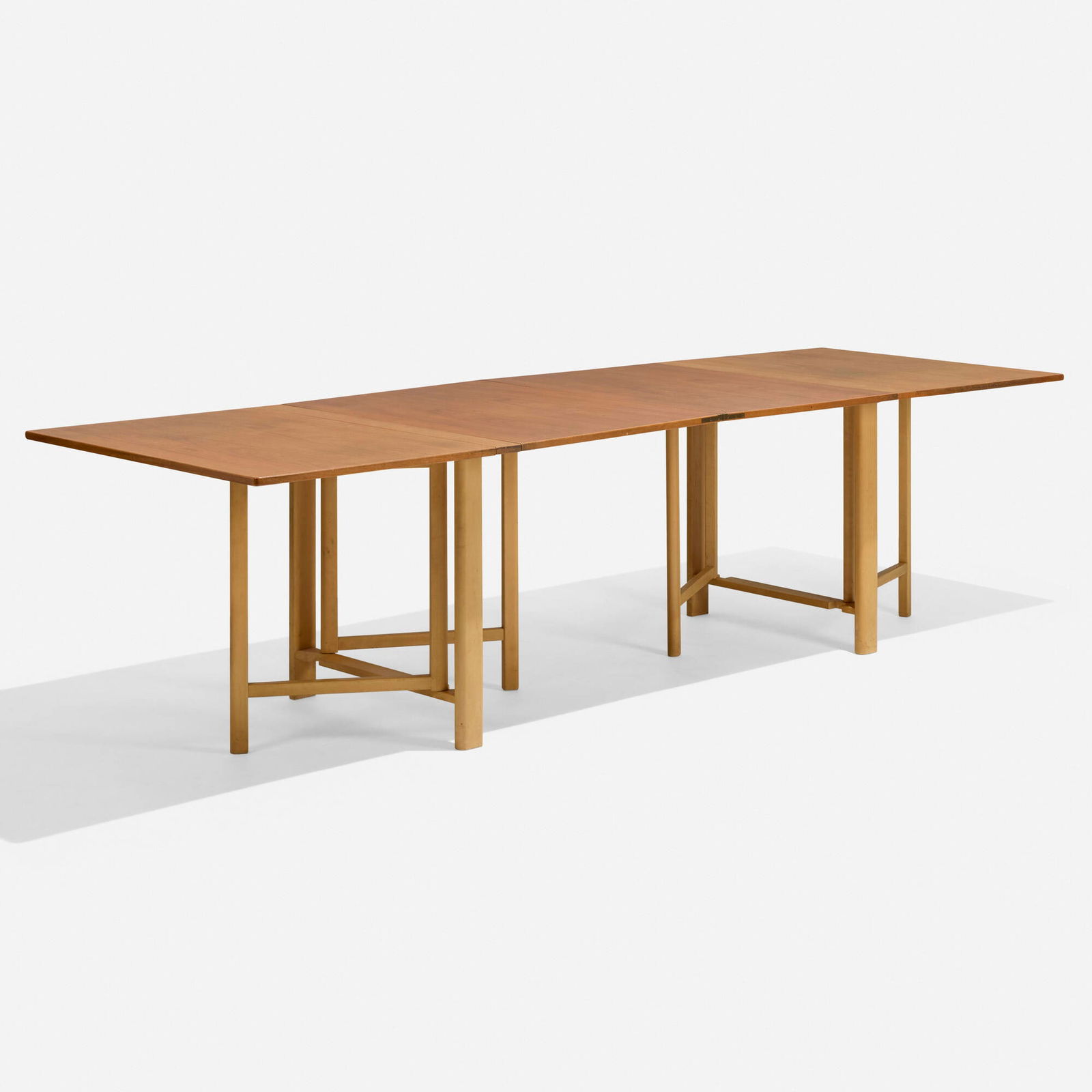 Bruno Mathsson, Maria folding table: Bruno Mathsson Maria folding table Firma Karl MathssonSweden, 1937birch, brass 28.5 h x 35.5 w x 9 d in (72 x 90 x 23 cm) Table features four 26-inch leaves and can be arranged in a vari