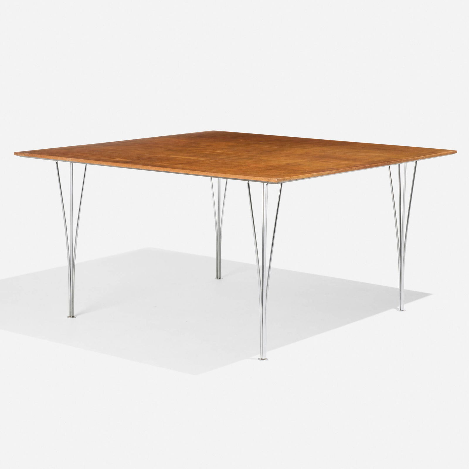 Arne Jacobsen, Piet Hein and Bruno Mathsson, Dining table: Arne Jacobsen, Piet Hein and Bruno Mathsson Dining table Fritz HansenDenmark/Sweden, 1968 / 1980teak, chrome-plated steel 28.75 h x 55 w x 55 d in (73 x 140 x 140 cm) Foil manufacturer's