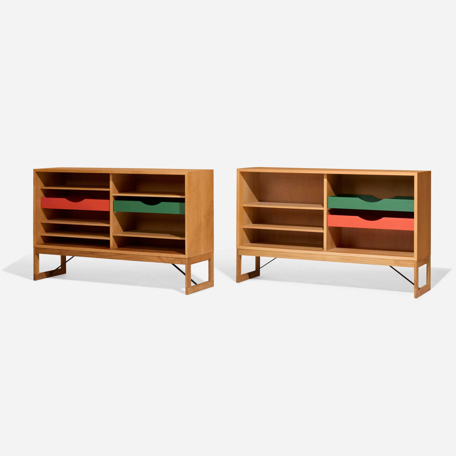 Borge Mogensen, Cabinets, pair: Borge Mogensen Cabinets, pair Karl Andersson & SonerDenmark / Sweden, c. 1955oak, painted wood, steel 33 h x 53 w x 14.25 d in (84 x 135 x 36 cm) Cabinets feature a total of four adjusta