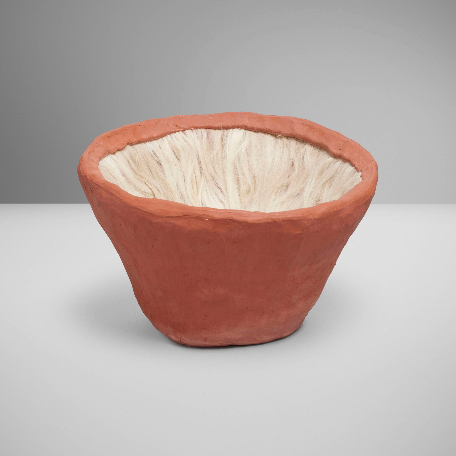 Tanya Aguiniga, Hold 4: Tanya Aguiniga Hold 4 2015 terracotta, alpaca fiber 4.25 h x 7.25 dia in (11 x 18 cm) Incised artist's cipher and date to underside '2015'. This work is unique. Provenance: