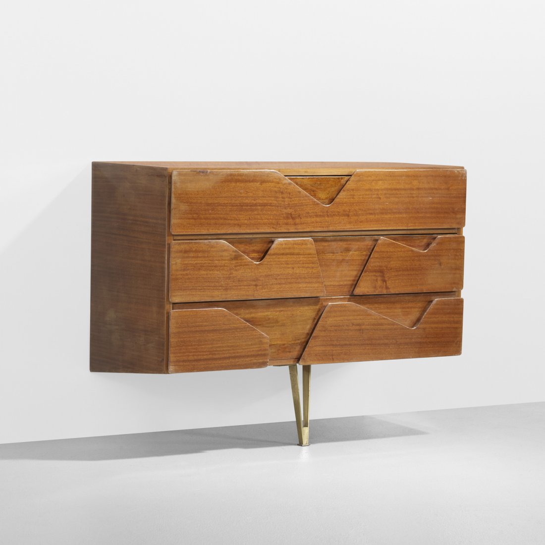 Gio Ponti wall-mounted cabinet: Gio Ponti wall-mounted cabinet from The Royal Hotel, Naples Giordano Chiesa Italy, 1953 ribbon mahogany, brass 39.5 w x 18.25 d x 32 h inches Cabinet features three drawers. Literature: Gio Ponti: L'A