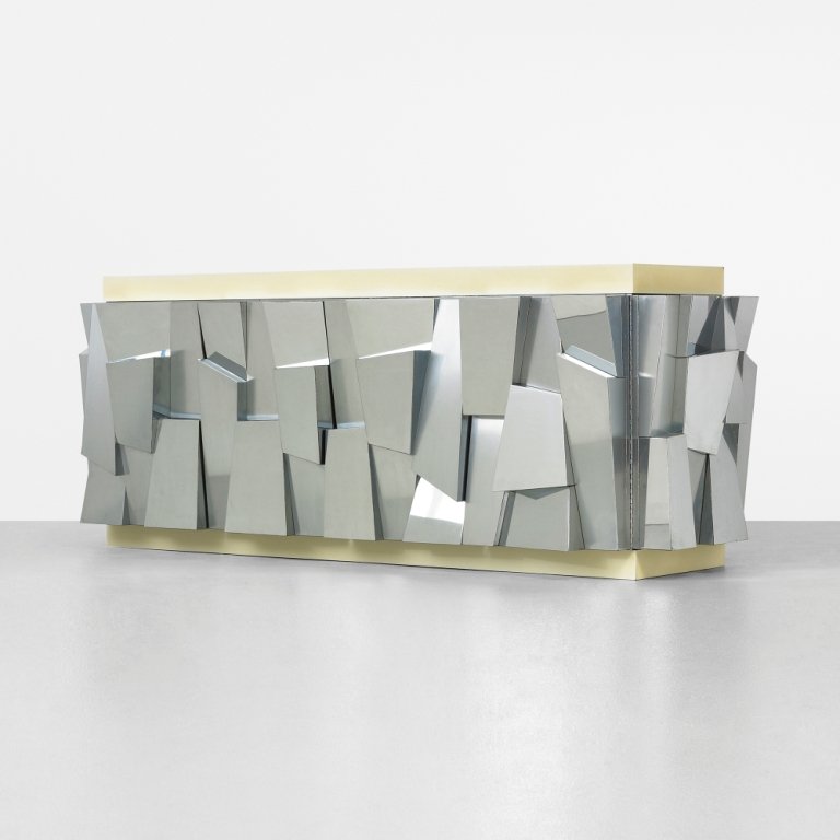 Paul Evans Faceted cabinet: Paul Evans Faceted cabinet Paul Evans Studio for Directional USA, c. 1970 chrome-plated steel, laminated wood 84 w x 25 d x 32.25 h inches Cabinet features two bi-fold doors concealing four adjustable