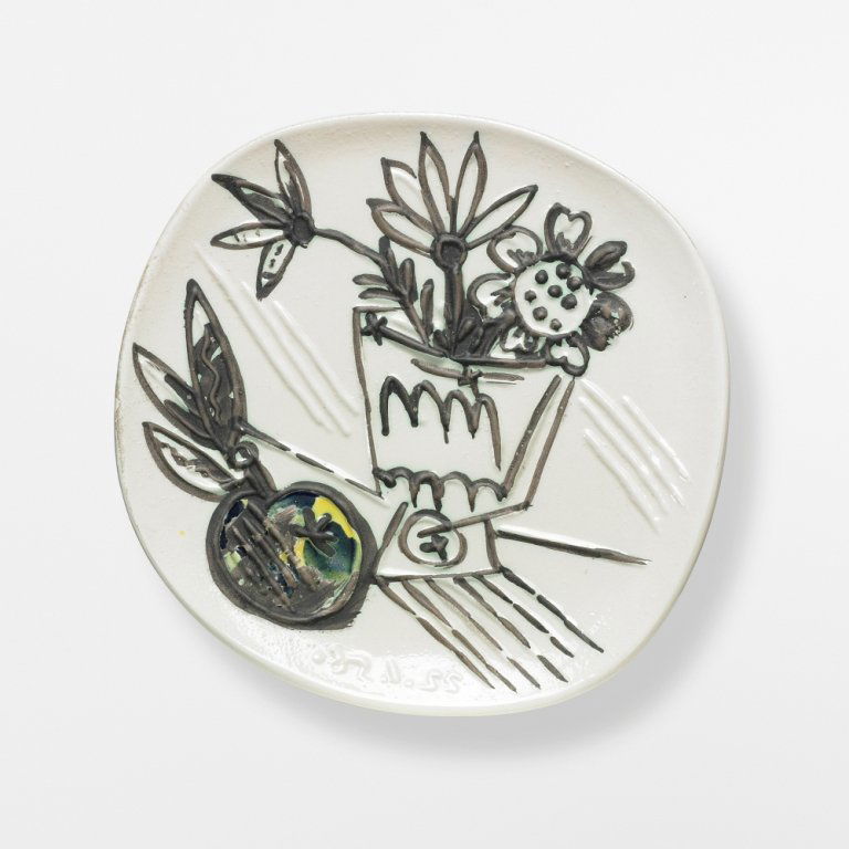 Pablo Picasso Bunch with Apple plate: Pablo Picasso Bunch with Apple plate Madoura Pottery Spain, 1956 glazed earthenware with oxidized paraffin decoration 9.75 w x 9.5 d x 1.25 h inches This work is from the edition of 400. Signed with i