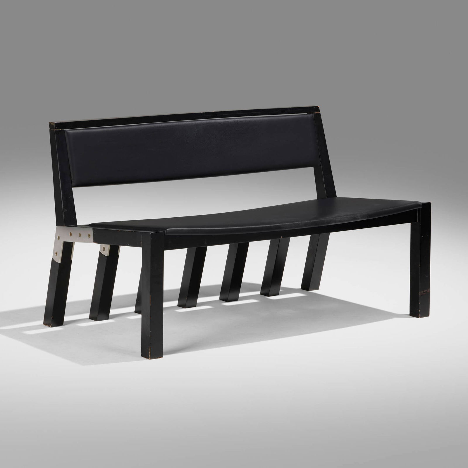 Jean-Michel Wilmotte, Settee: Jean-Michel Wilmotte Settee TecnoFrance / Italy, 1993lacquered wood, chrome-plated brass, leather upholstery 24 h x 41 w x 23 d in (61 x 104 x 58 cm) Circular manufacturer's label to bac