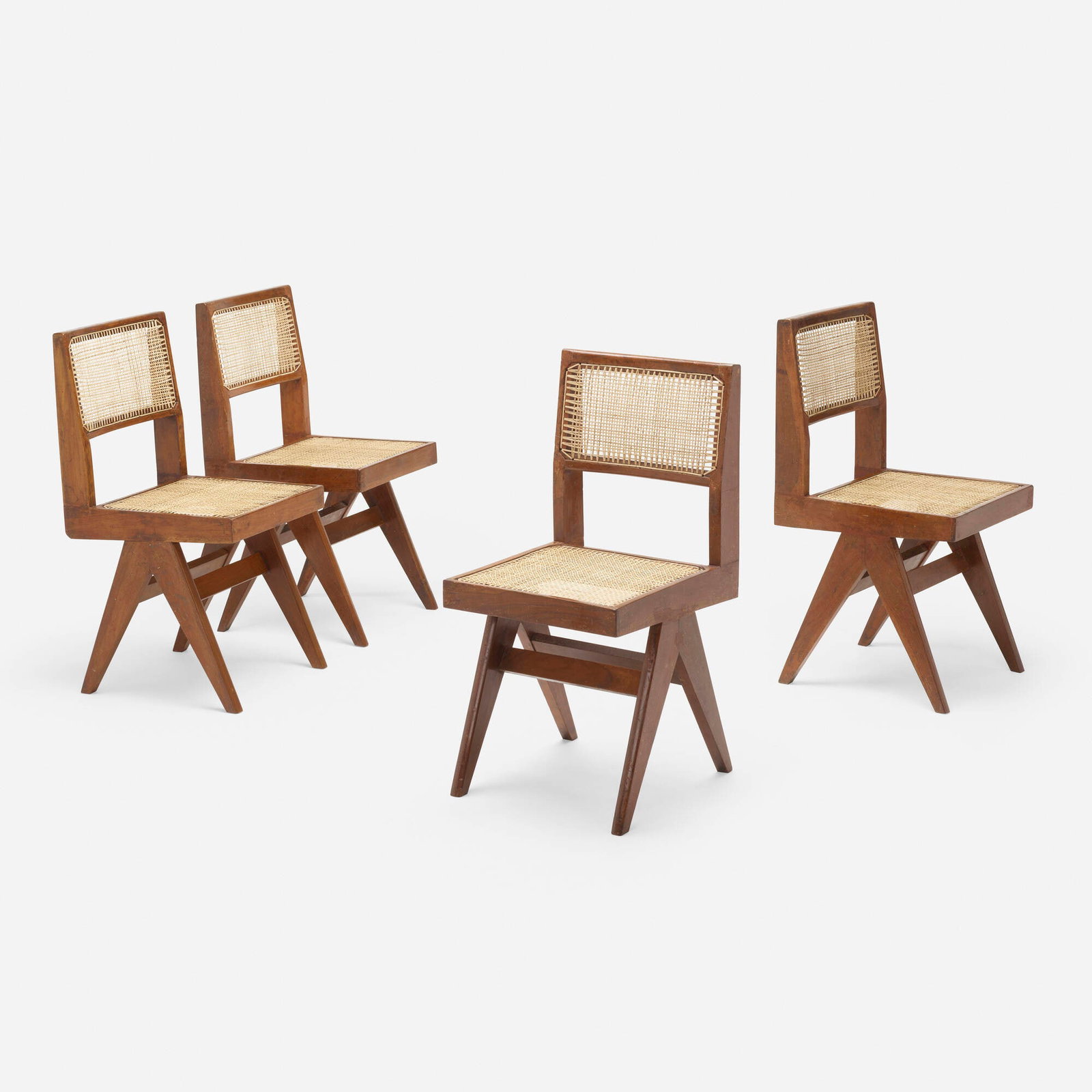 Pierre Jeanneret, Dining chairs from Punjab University Student Residences, Chandigarh, set of four: Pierre Jeanneret Dining chairs from Punjab University Student Residences, Chandigarh, set of four France/India, c. 1958-59 teak, cane, upholstery 33.25 h x 16 w x 17.5 d in (84 x 41 x 44 cm)