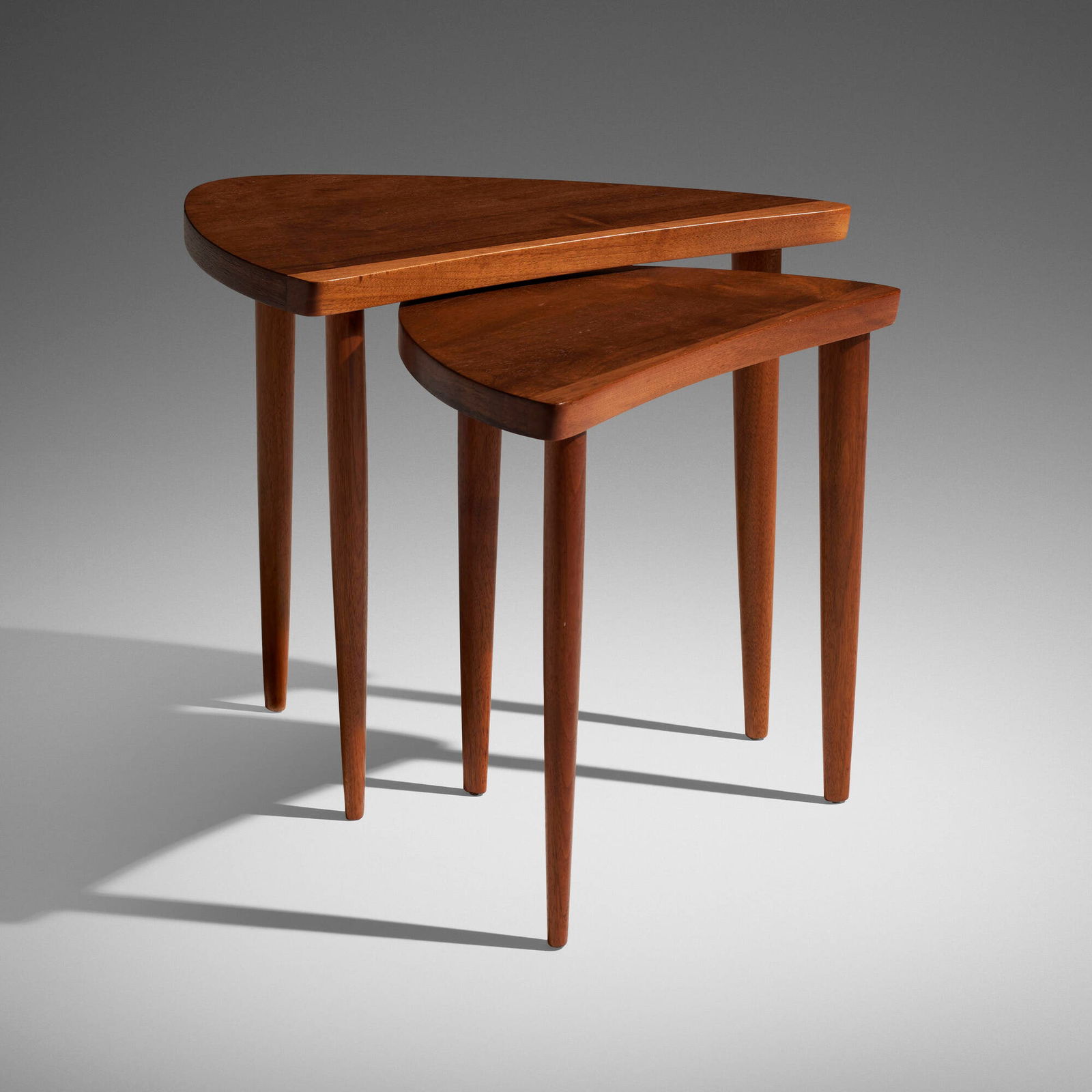 George Nakashima, Origins nesting tables model 267, set of two: George Nakashima Origins nesting tables model 267, set of two WiddicombUSA, 1958laurel, walnut 19 h x 21 w x 16 d in (48 x 53 x 41 cm) 17.5 h x 18.25 w x 13.5 d in (44 x 46 x 34 cm) S