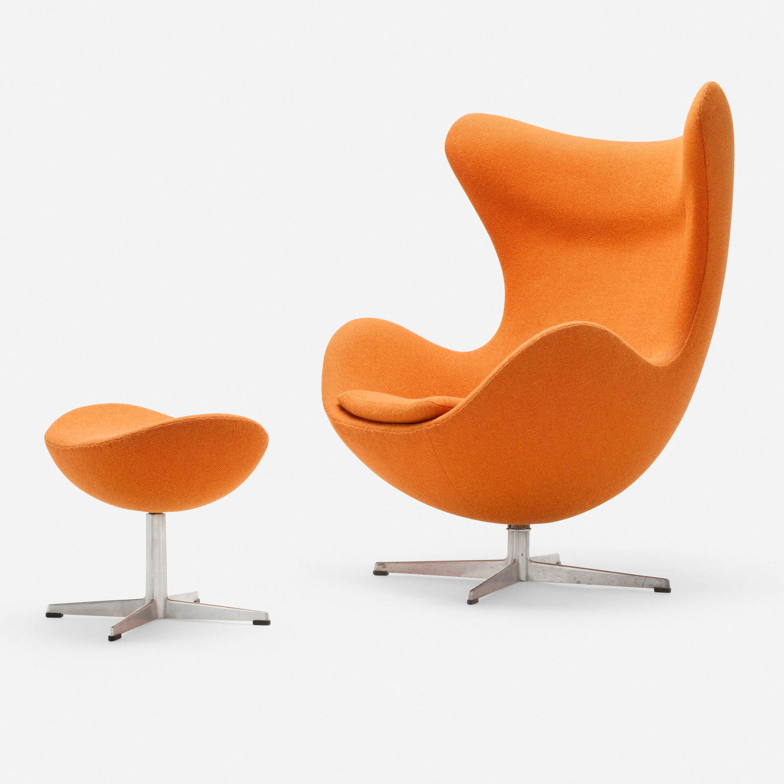 Arne Jacobsen, Egg chair and ottoman: Arne Jacobsen Egg chair and ottoman Fritz HansenDenmark, 1958upholstery, cast aluminum, plastic chair: 41.75 h x 35 w x 32 d in (106 x 89 x 81 cm) ottoman: 17 h x 20.5 w x 15.5 d in (43 x 52