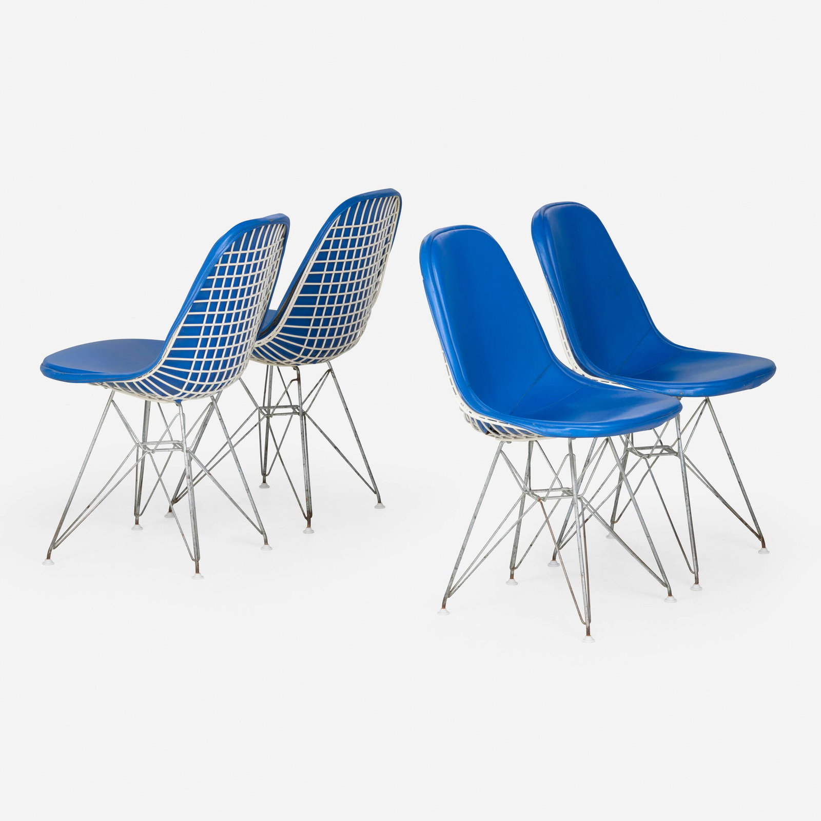 Charles and Ray Eames, DKR-1s, set of four: Charles and Ray Eames DKR-1s, set of four Herman Miller USA, 1951 enameled and brushed steel, vinyl upholstery, plastic 32 h x 19 w x 21 d in (81 x 48 x 53 cm) Upholstery manufacturer's la