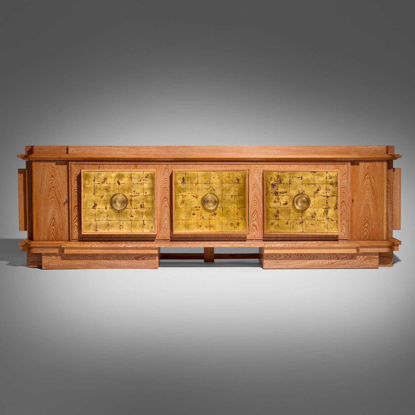 Andre Arbus, Rare and Important buffet: Andre Arbus Rare and Important buffet France, 1939cerused oak, gilt bronze, gold leaf over wood 43.75 h x 137.75 w x 25.75 d in (111 x 350 x 65 cm) Buffet features three doors each concealing