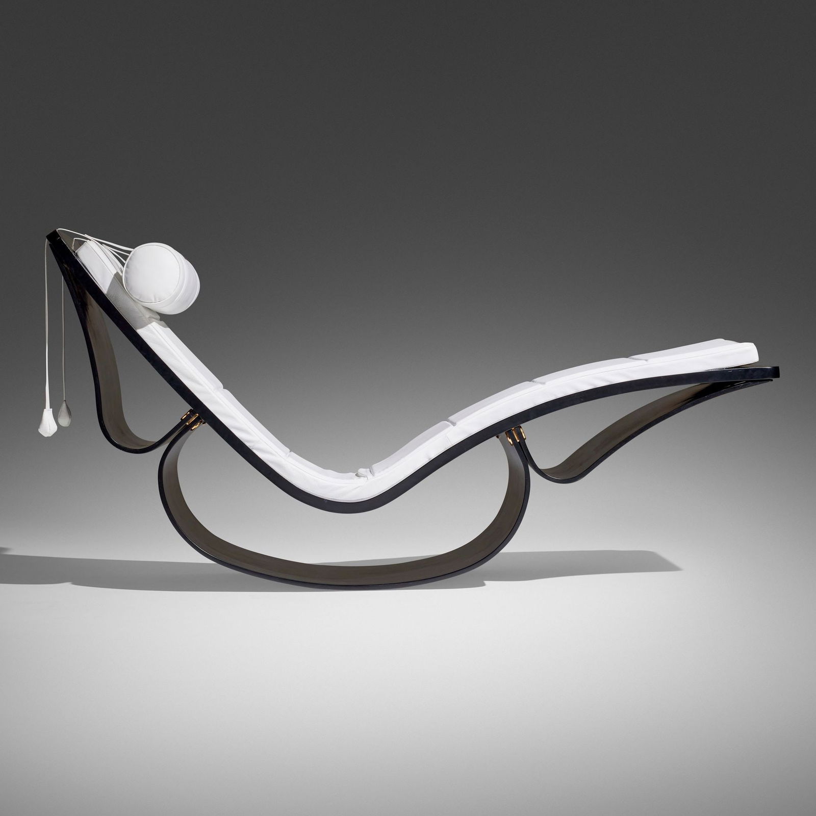 Oscar and Anna Maria Niemeyer, Rio chaise lounge: Oscar and Anna Maria Niemeyer Rio chaise lounge FasemBrazil / Italy, c. 1978 / c. 1990lacquered wood, leather upholstery, rubber, brass 36.000 h x 64.000 w x 22.500 d in (91 x 163 x 57 cm) <