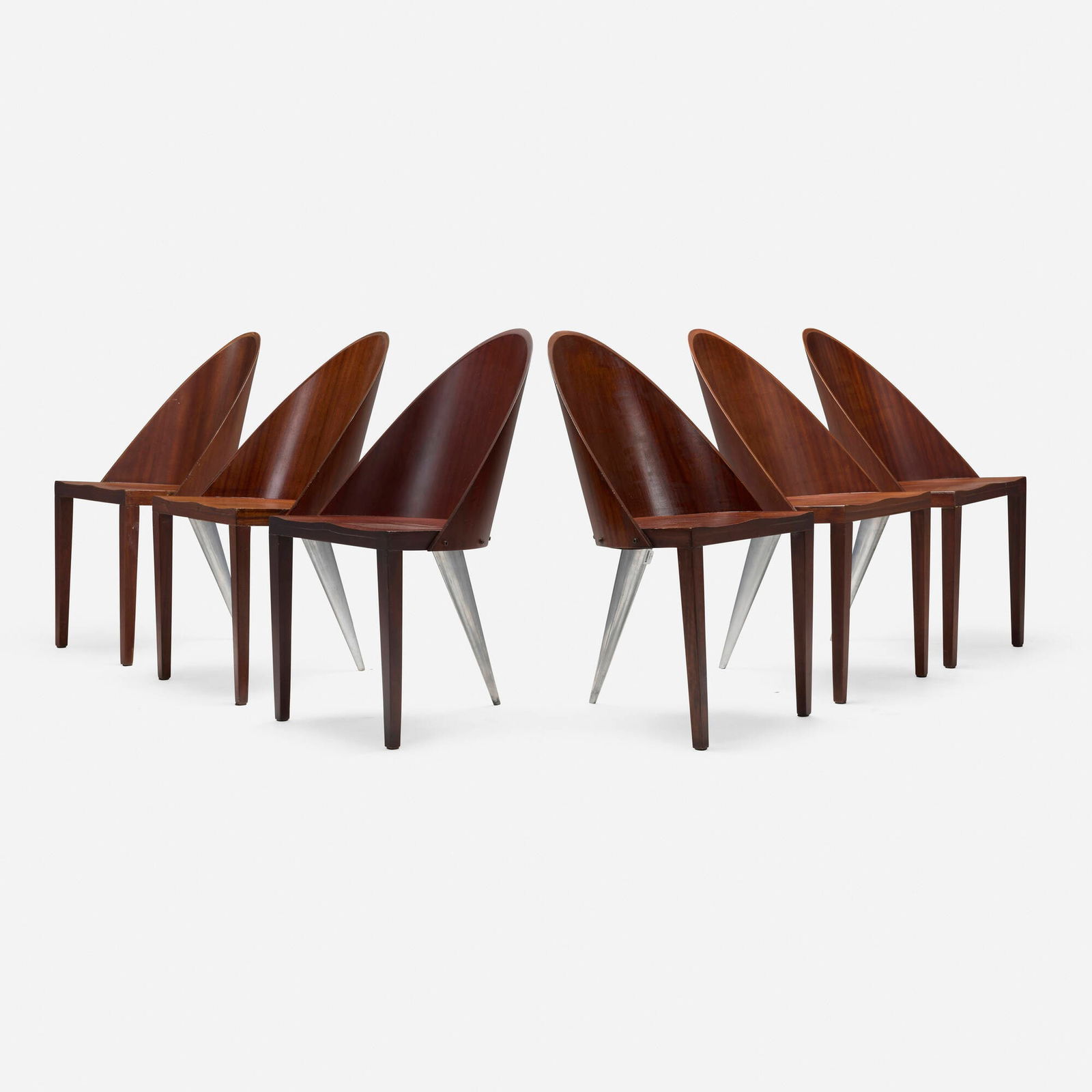 Philippe Starck, Royalton dining chairs, set of six: Philippe Starck Royalton dining chairs, set of six Driade AlephFrance, 1988pau rosa plywood, cast aluminum 33.625 h x 18.625 w x 21 d in (85 x 47 x 53 cm) Paper label to underside of one