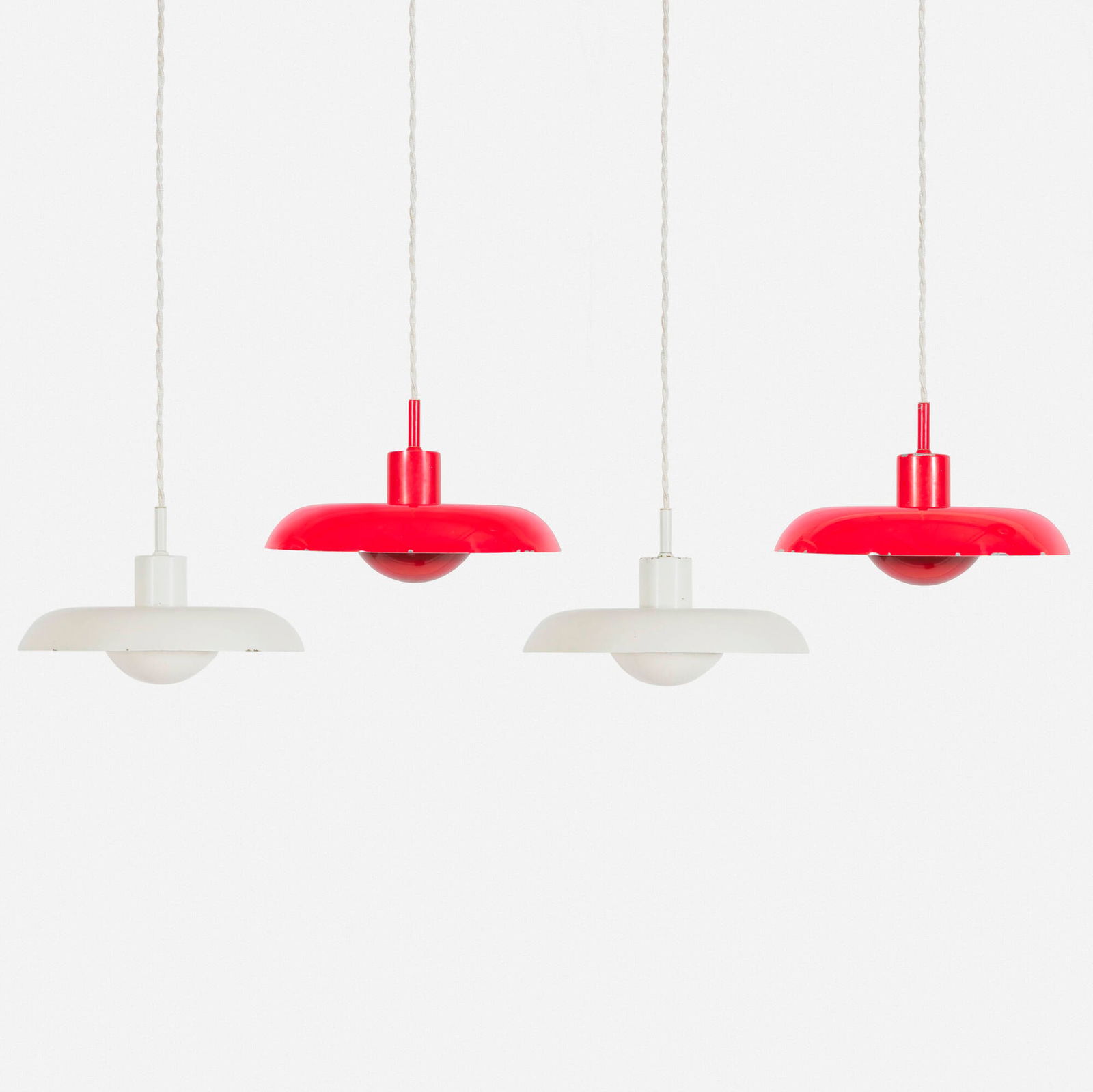 Piet Hein, RA-24 pendant lamps, set of four: Piet Hein RA-24 pendant lamps, set of four LyfaDenmark, 1970lacquered aluminum 6 h x 9.5 dia in (15 x 24 cm) Impressed manufacturer's mark to top of each example 'Lyfa'.