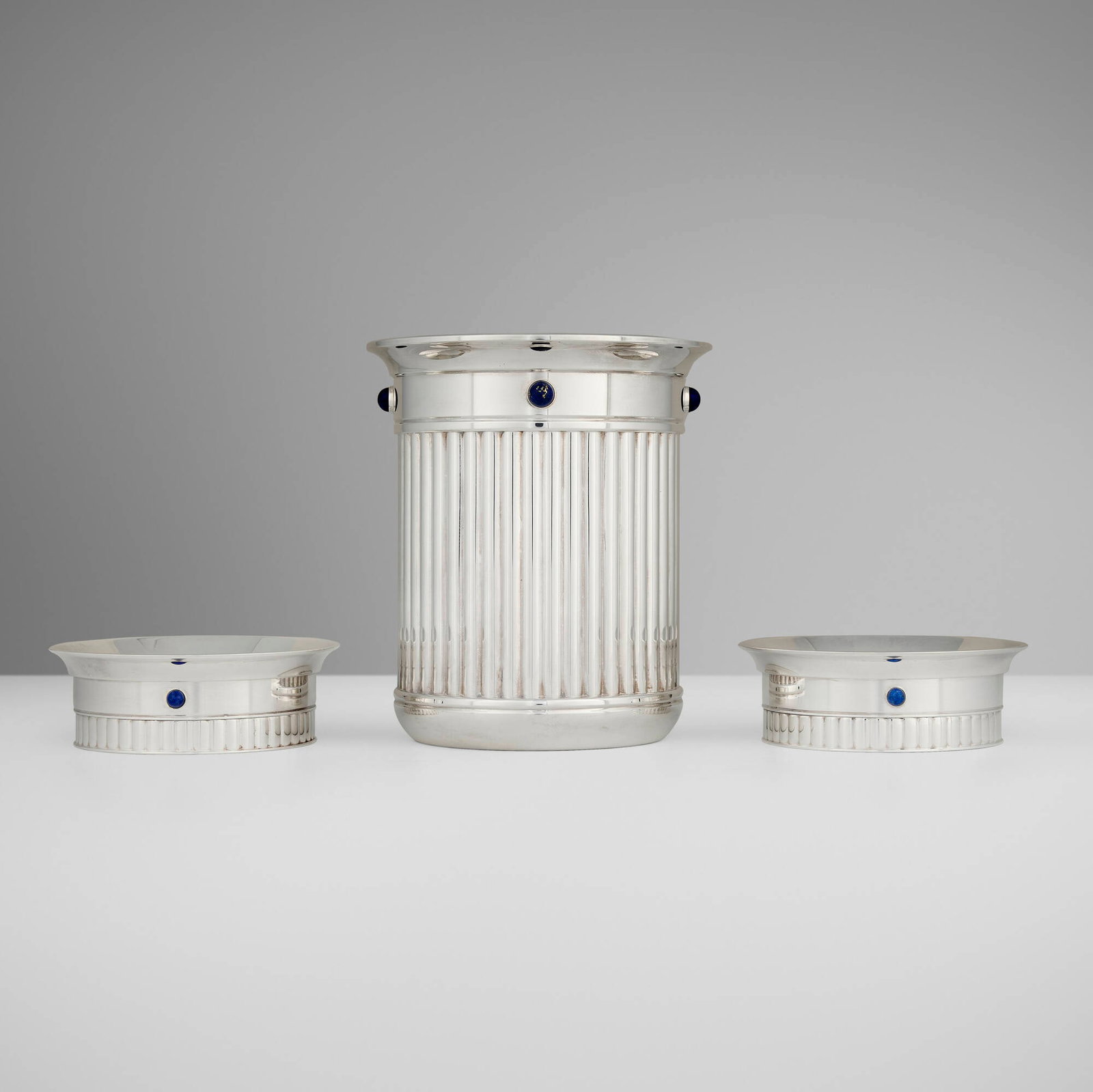 Cartier, Lapis Collection bar accessories, set of three: Cartier Lapis Collection bar accessories, set of three France / Spain, 1990 silver-plated metal, lapis lazuli 6.25 h x 5.5 dia in (16 x 14 cm) 1.5 h x 4.5 dia in (4 x 11 cm) Set is comprised