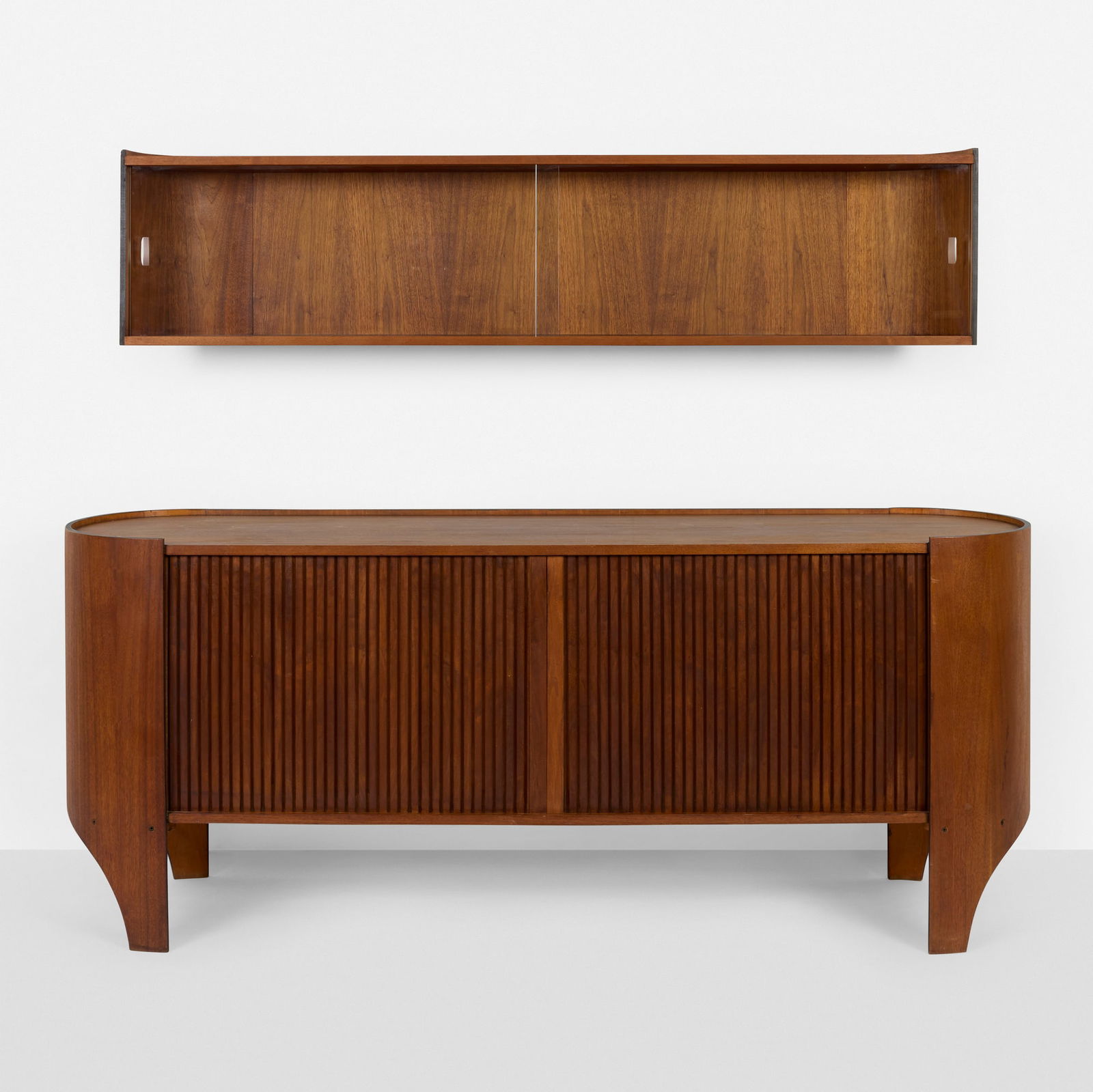 Henry P. Glass, Cylindra cabinet with wall-mounted hutch: Henry P. Glass Cylindra cabinet with wall-mounted hutch Richbilt Manufacturing CompanyUSA, 1966walnut plywood, walnut, glass, lacquered walnut cabinet: 30.5 h x 72 w x 18 d in (77 x 183 x 46 cm