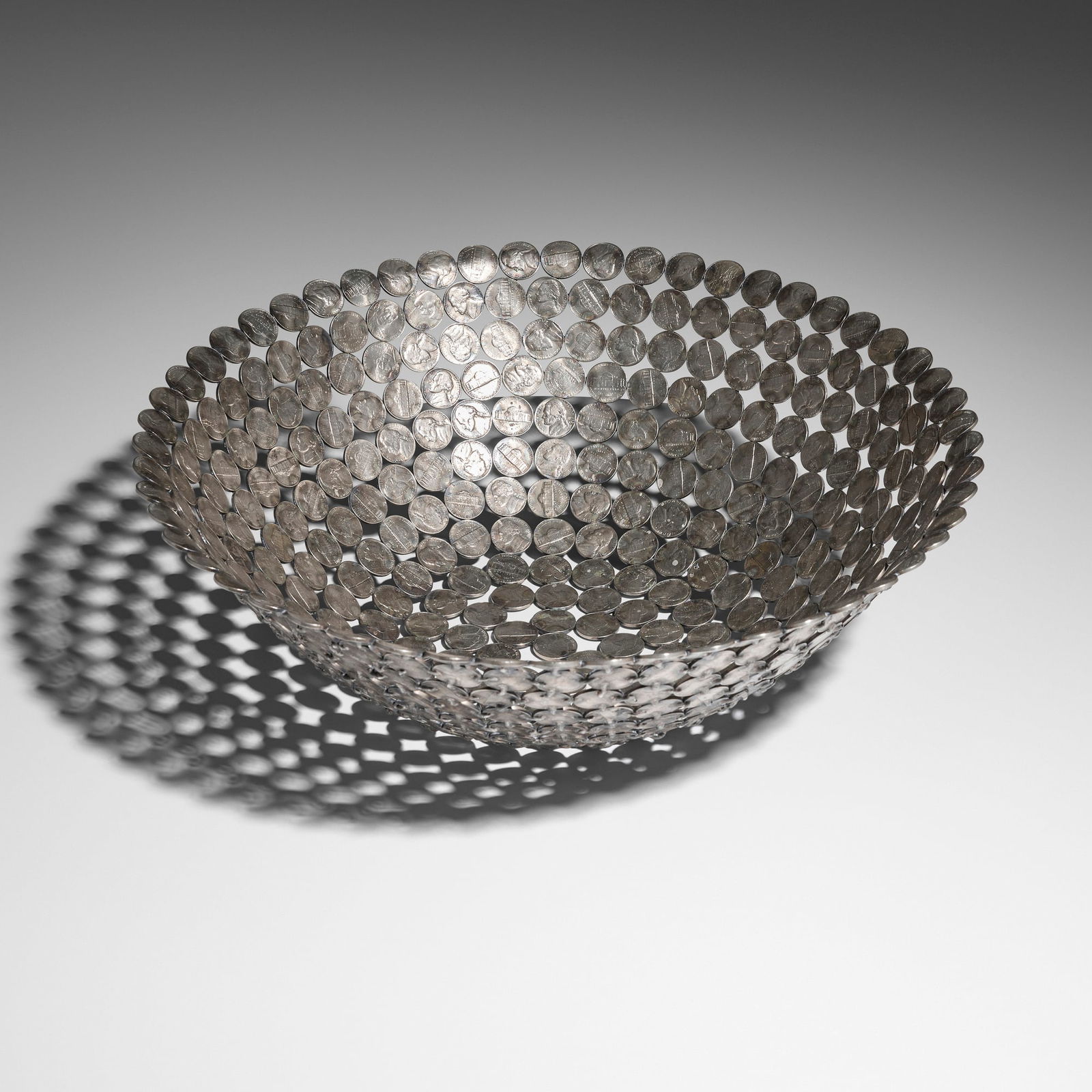 Johnny Swing, Nickel bowl #18: Johnny Swing Nickel bowl #18 USA, 2012welded U.S. nickels 5 h x 15 dia in (13 x 38 cm) Incised signature, date, and number to underside 'Johnny Swing 2012 #18'. Provenance: