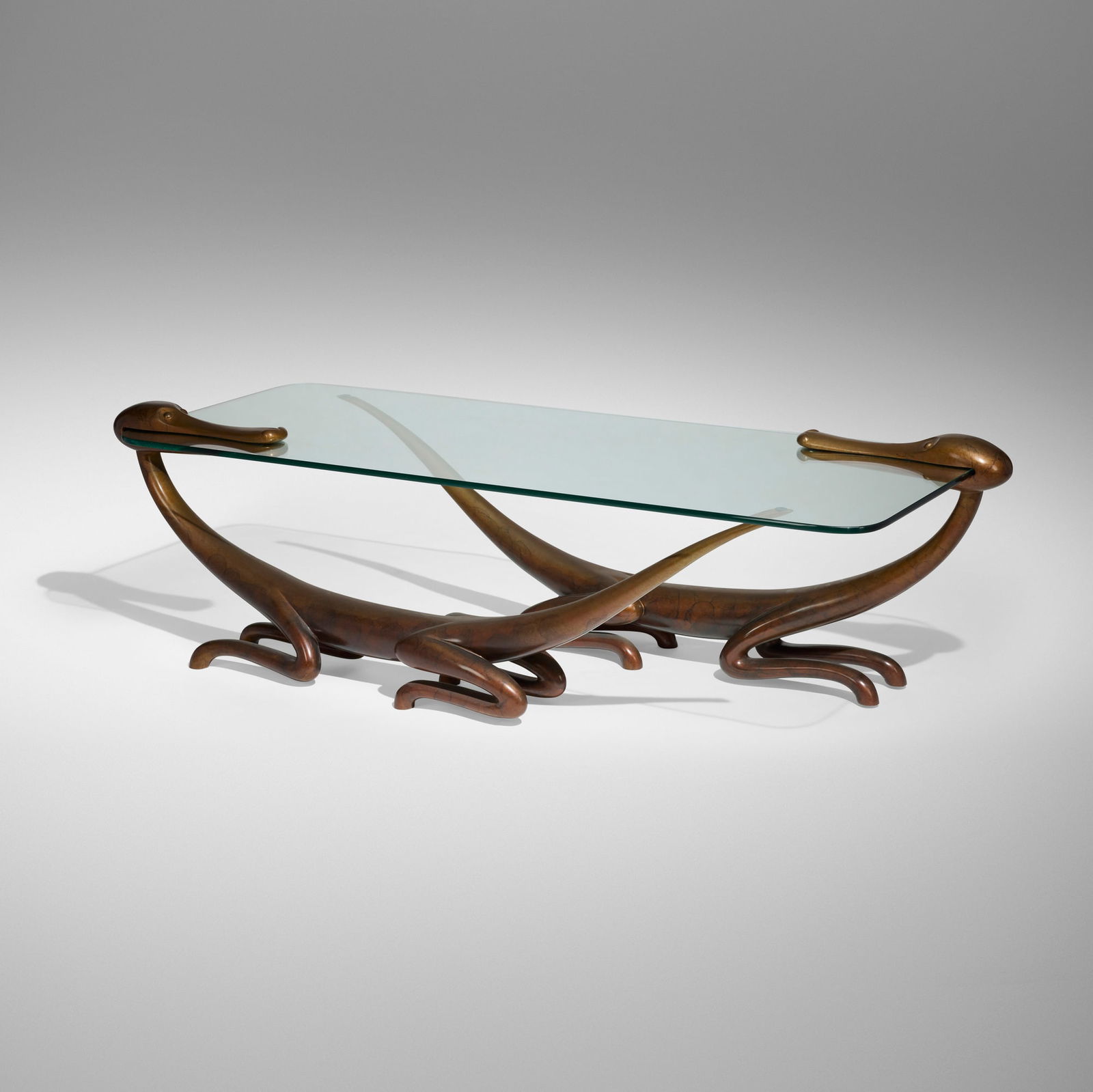 Judy Kensley McKie, Dragon table: Judy Kensley McKie Dragon table USA, 1997patinated bronze, glass 19.25 h x 64 w x 24 d in (49 x 163 x 61 cm) Incised signature, date and number to underside of each base '? JKM 1997 5/12'. Thi