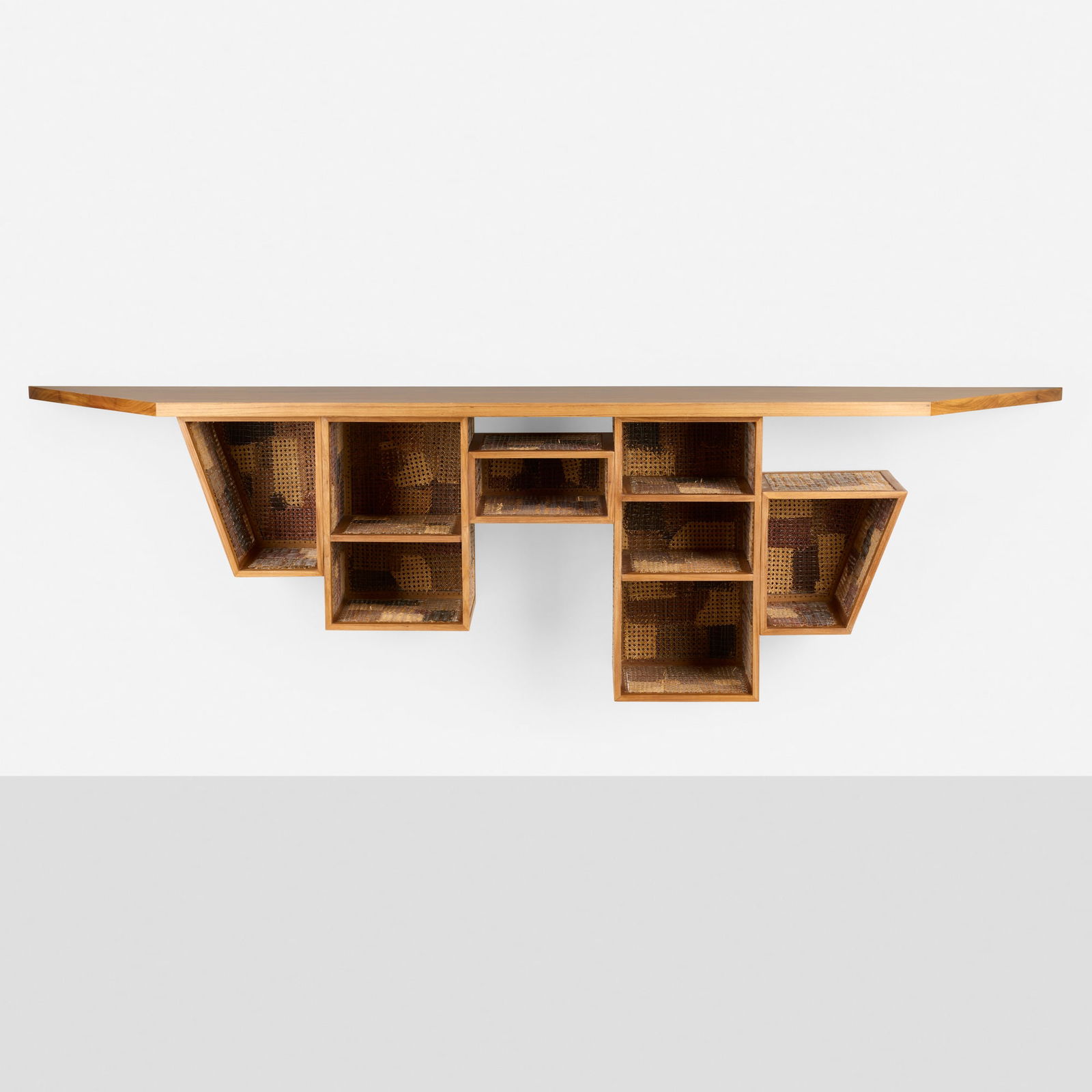 Fernando and Humberto Campana, Prototype Detonado cabinet: Fernando and Humberto Campana Prototype Detonado cabinet Brazil, 2015freijo, reclaimed Thonet wicker, nylon cord 32.75 h x 118.25 w x 17.75 d in (83 x 300 x 45 cm) Provenance: