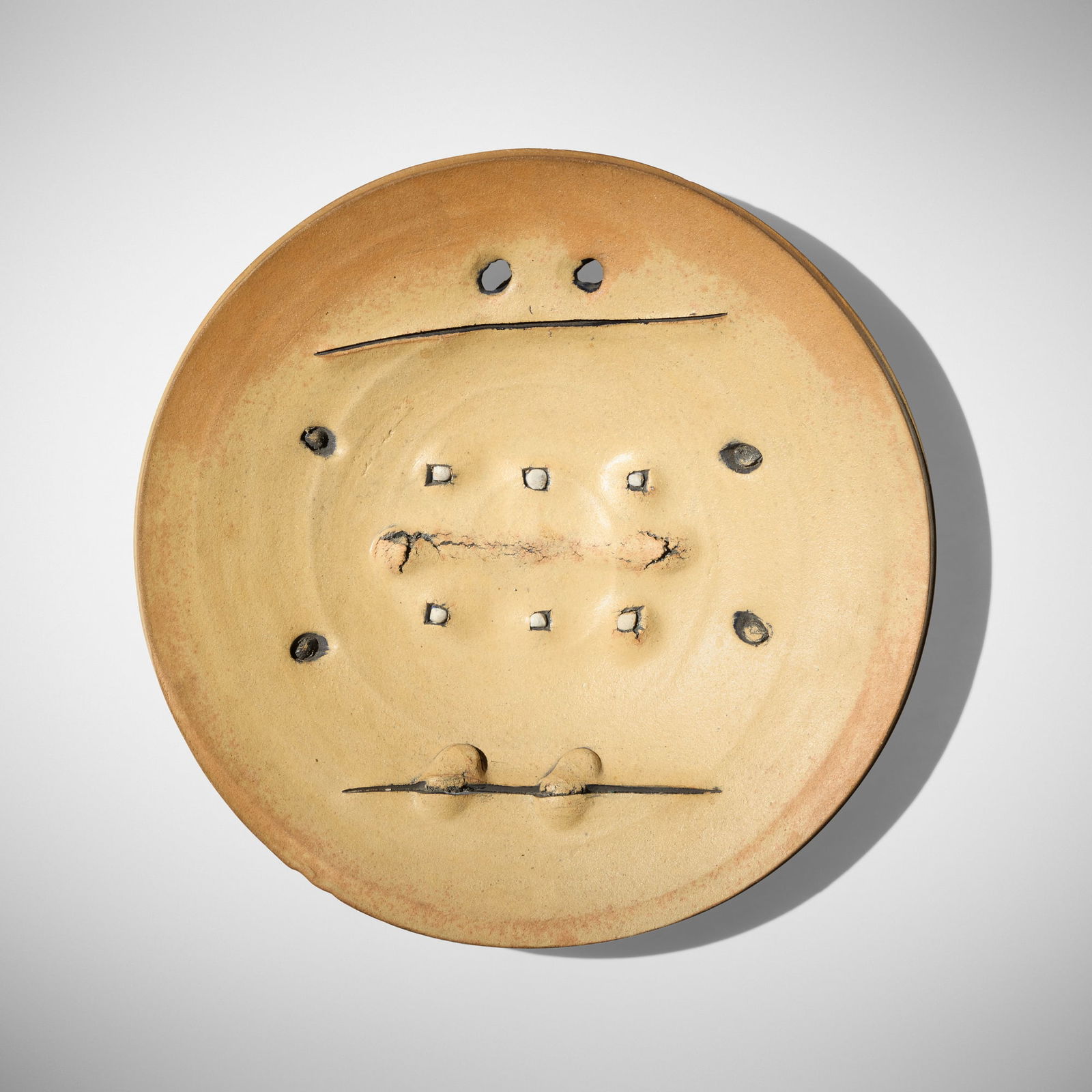 Peter Voulkos, Untitled (Plate): Peter Voulkos Untitled (Plate) 1973glazed and incised gas-fired stoneware with porcelain pass-throughs 3.25 h x 18.75 dia in (8 x 48 cm) Glazed signature and date to underside 'Voulkos 73'.