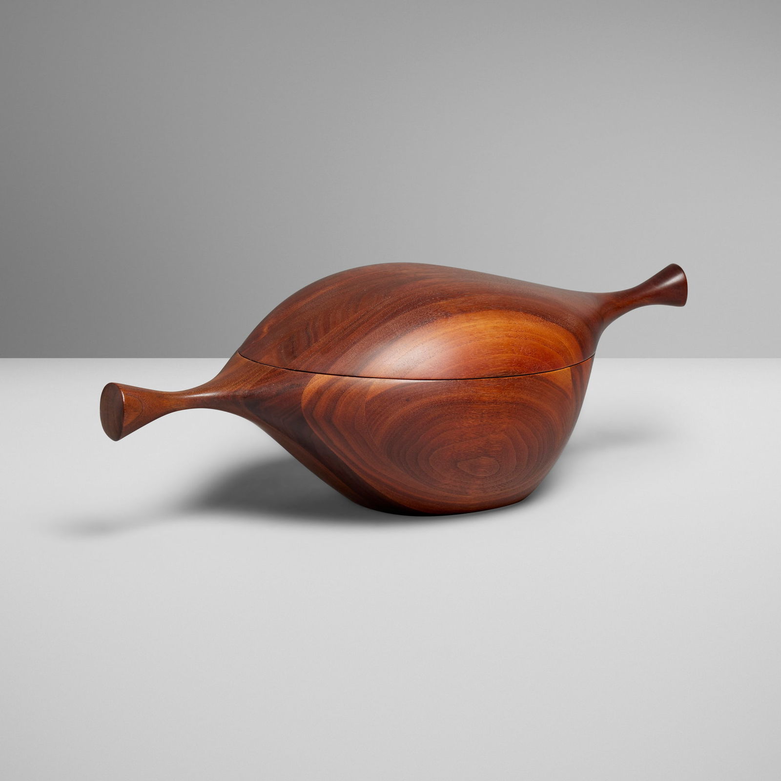 Daniel Loomis Valenza, Covered bowl: Daniel Loomis Valenza Covered bowl c. 1960walnut 5.25 h x 6.5 w x 15.25 d in (13 x 17 x 39 cm) This work will ship from Los Angeles, California.