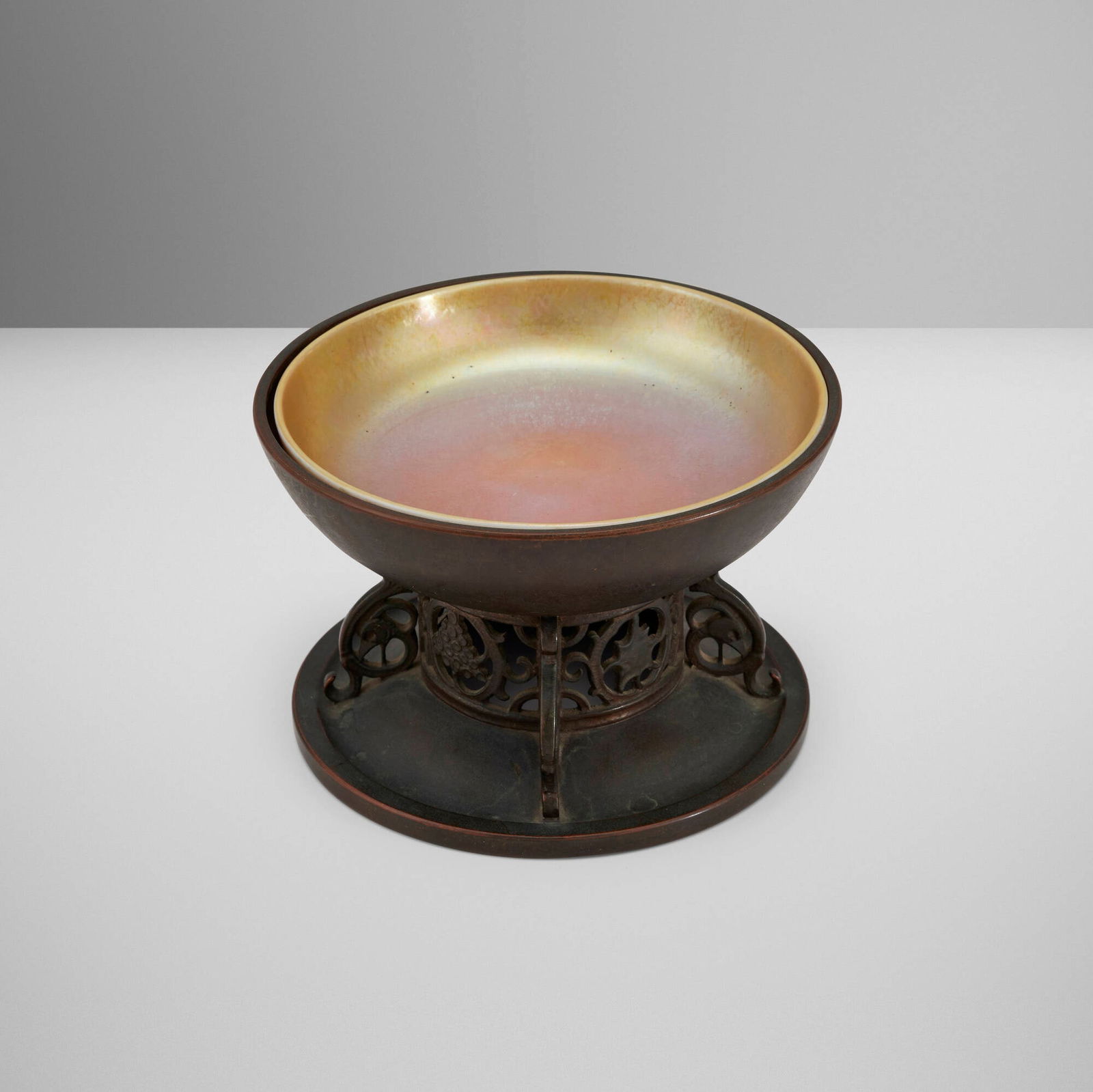 Oscar Bach, Centerpiece with Steuben insert: Oscar Bach Centerpiece with Steuben insert USA, c. 1925bronze, Aurene and Calcite glass 4.75 h x 7.25 dia in (12 x 18 cm) Impressed manufacturer's mark to underside 'Oscar Bach pat. applied fo