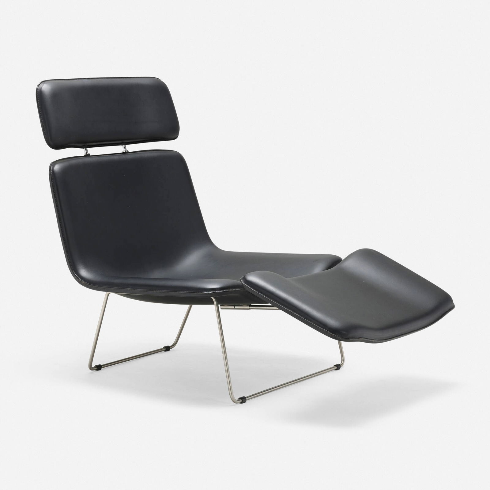Erwan Bouroullec, SG/4T Spring lounge chair: Erwan Bouroullec SG/4T Spring lounge chair CappelliniFrance / Italy, 2000leather, stainless steel 37.5 h x 31 w x 49 d in (95 x 79 x 124 cm) Lounge chair features an integrated ottoman.