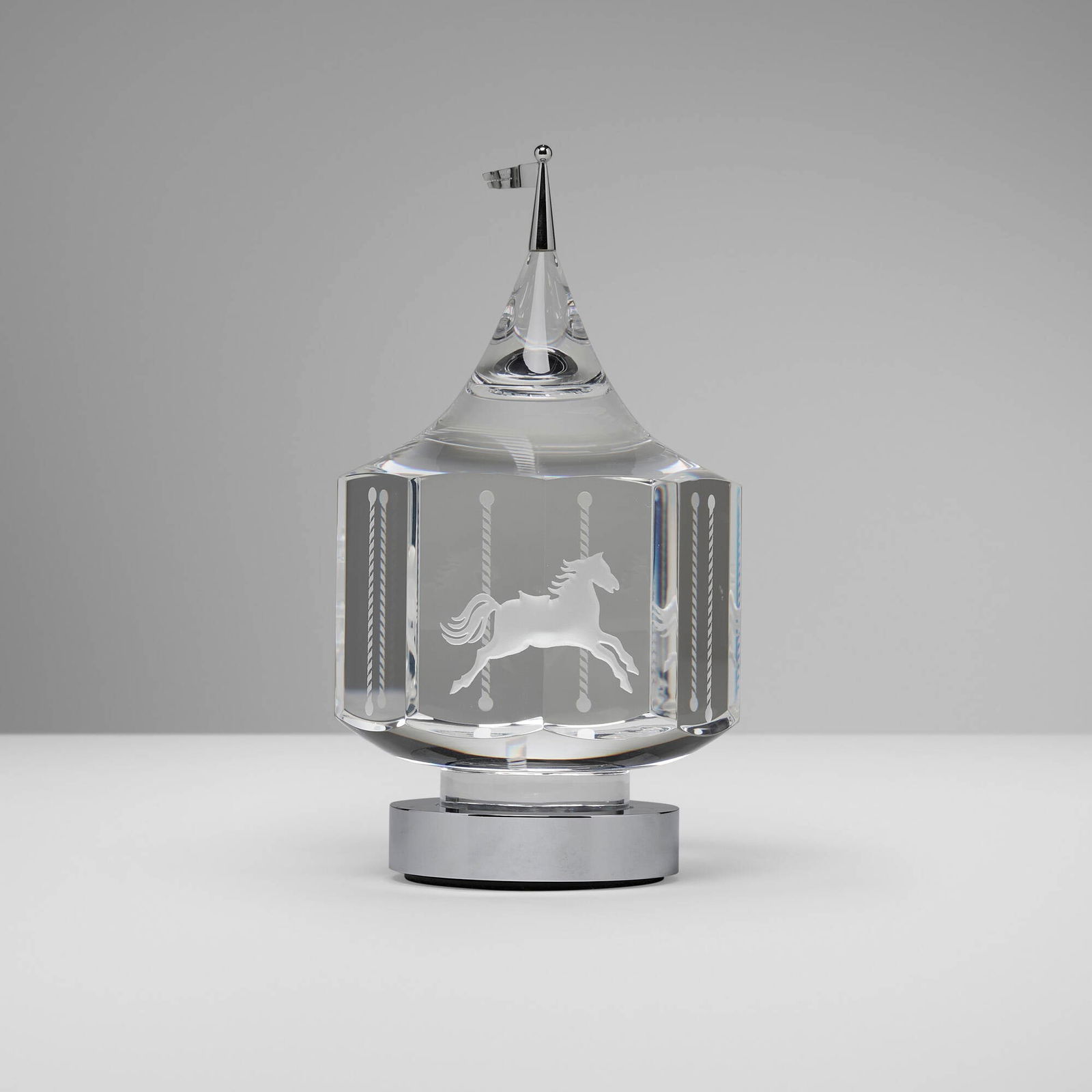 Peter Aldridge and Jane Osborn-Smith for Steuben, Carousel from the Major Ornamental Designs series: Peter Aldridge and Jane Osborn-Smith for Steuben Carousel from the Major Ornamental Designs series USA, 1985etched lead glass, silver 7.75 h x 4.25 dia in (20 x 11 cm) Incised manufacturer's m