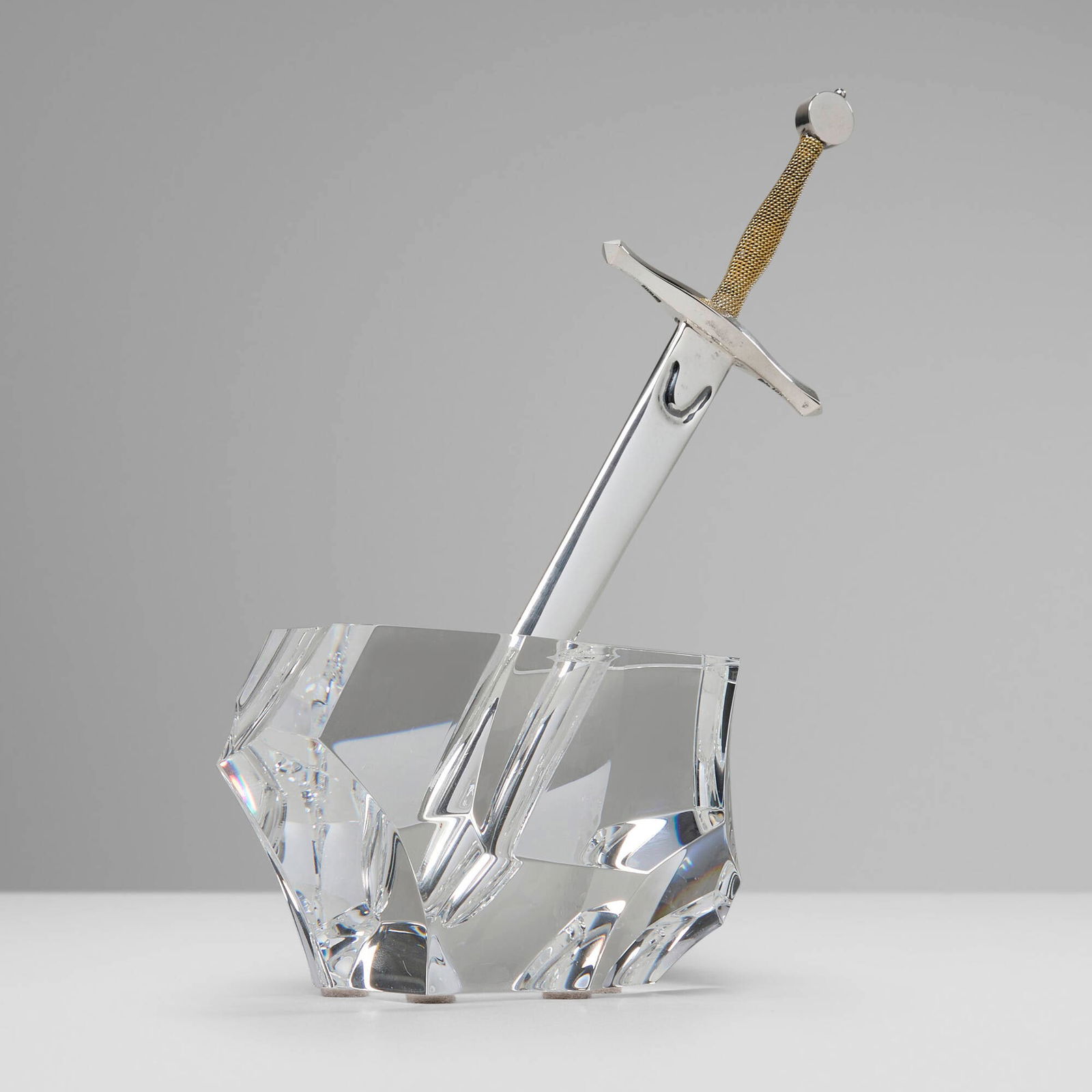 James Houston for Steuben, Excalibur paperweight and letter opener: James Houston for Steuben Excalibur paperweight and letter opener USA, c. 1964lead glass, sterling silver, 18k yellow gold 8 h x 6.25 w x 3 d in (20 x 16 x 8 cm) Incised manufacturer's mark to