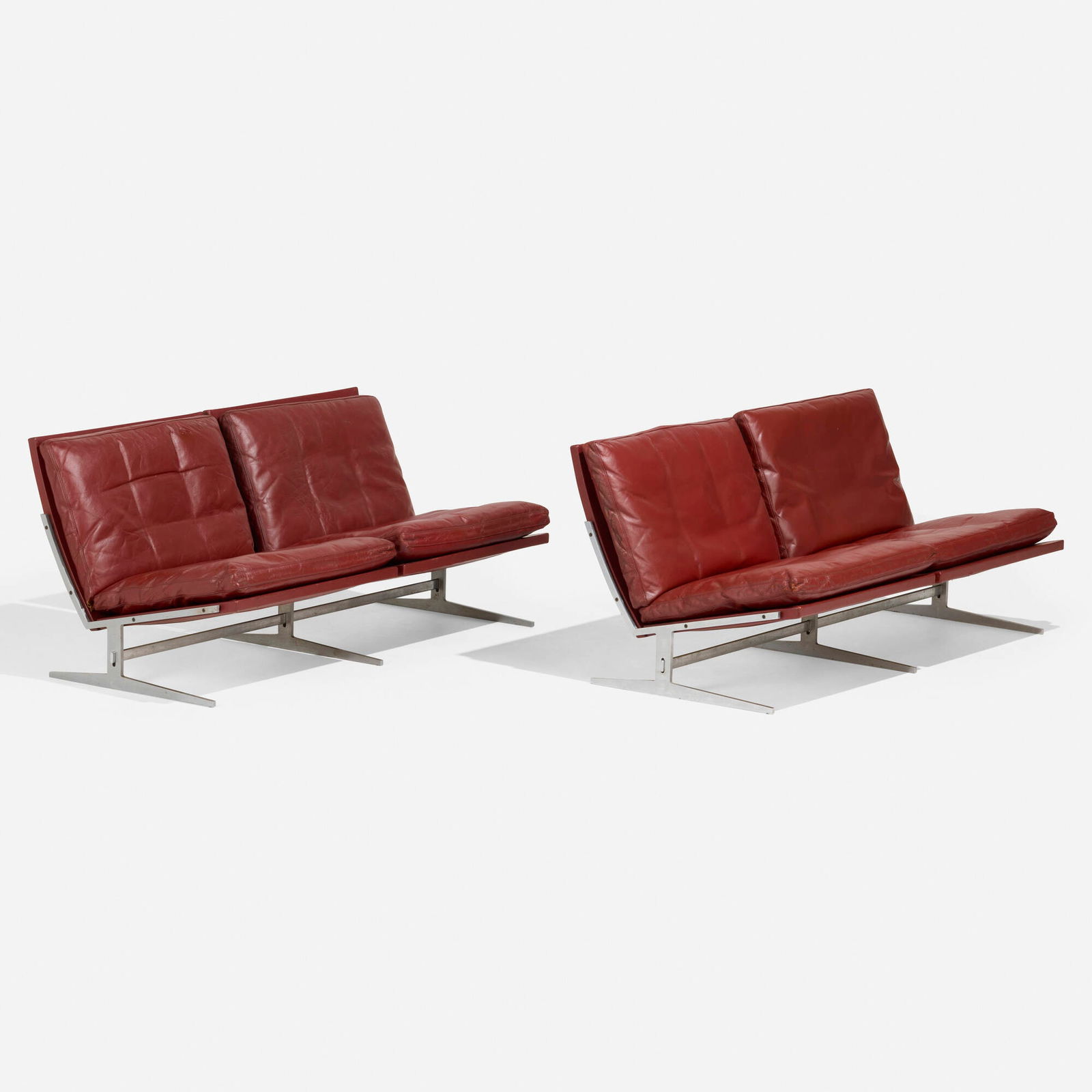 Preben Fabricius and Jorgen Kastholm, Settees model BO561, pair: Preben Fabricius and Jorgen Kastholm Settees model BO561, pair Bo-ExDenmark, c. 1970leather upholstery, matte chrome-plated steel 26.5 h x 59.5 w x 30.5 d in (67 x 151 x 77 cm) L