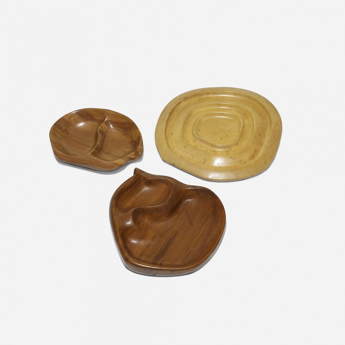 Russel Wright set of three Oceana serving trays: Russel Wright set of three Oceana serving trays Klise Woodworking USA, 1935 carved and stained maple 15 w x 15 d x 1.25 h inches Branded signature to underside of each example: [Russel Wright]. Litera