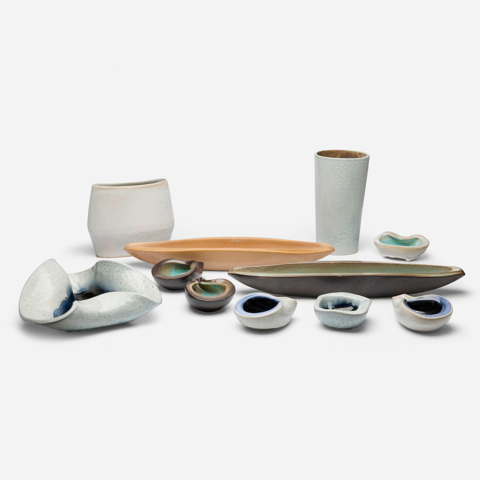 Russel Wright, Collection of eleven vessels: Russel Wright Collection of eleven vessels BauerUSA, c. 1945glazed stoneware tallest: 11.75 h x 6.5 w x 5 d in (30 x 17 x 13 cm) shortest: 2.25 h x 5.25 w x 5.25 d in (6 x 13 x 13 cm)