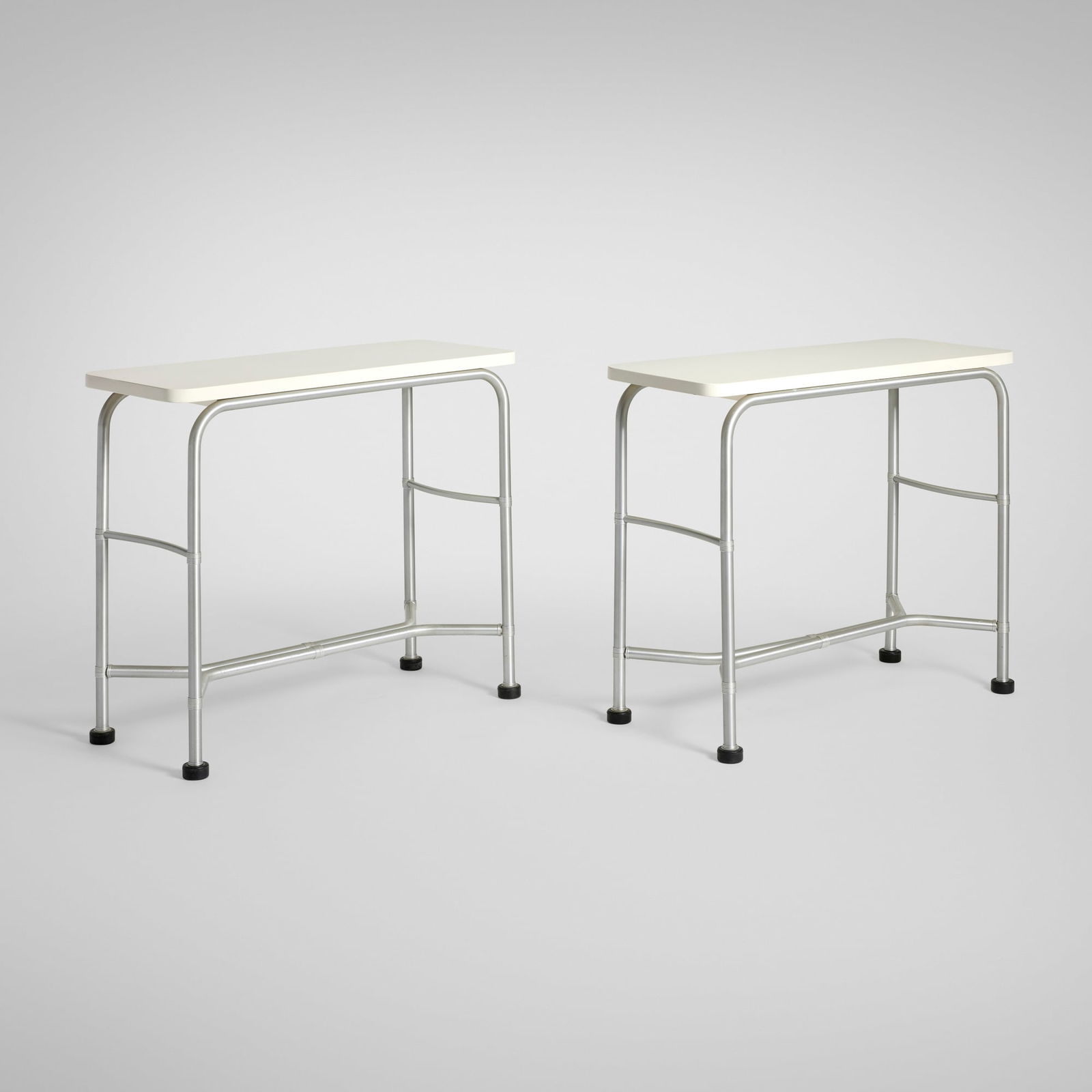 Warren McArthur, Console tables, pair: Warren McArthur Console tables, pair Warren McArthur CorporationUSA, c. 1933aluminum, painted wood, rubber 30.25 h x 35.25 w x 14 d in (77 x 90 x 36 cm) Provenance: Nich