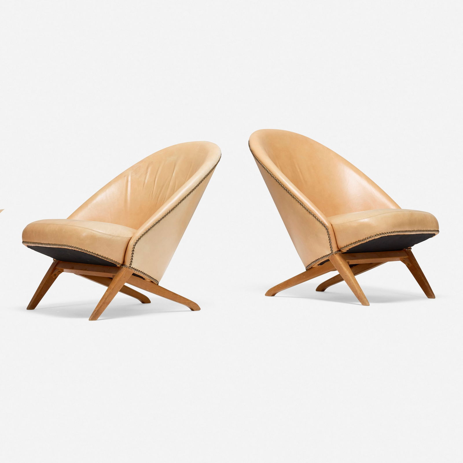 Theo Ruth, Lounge chairs, pair: Theo Ruth Lounge chairs, pair ArtifortThe Netherlands, c. 1955leather, ash 29 h x 28 w x 28 d in (74 x 71 x 71 cm) This work will ship from Los Angeles, California.