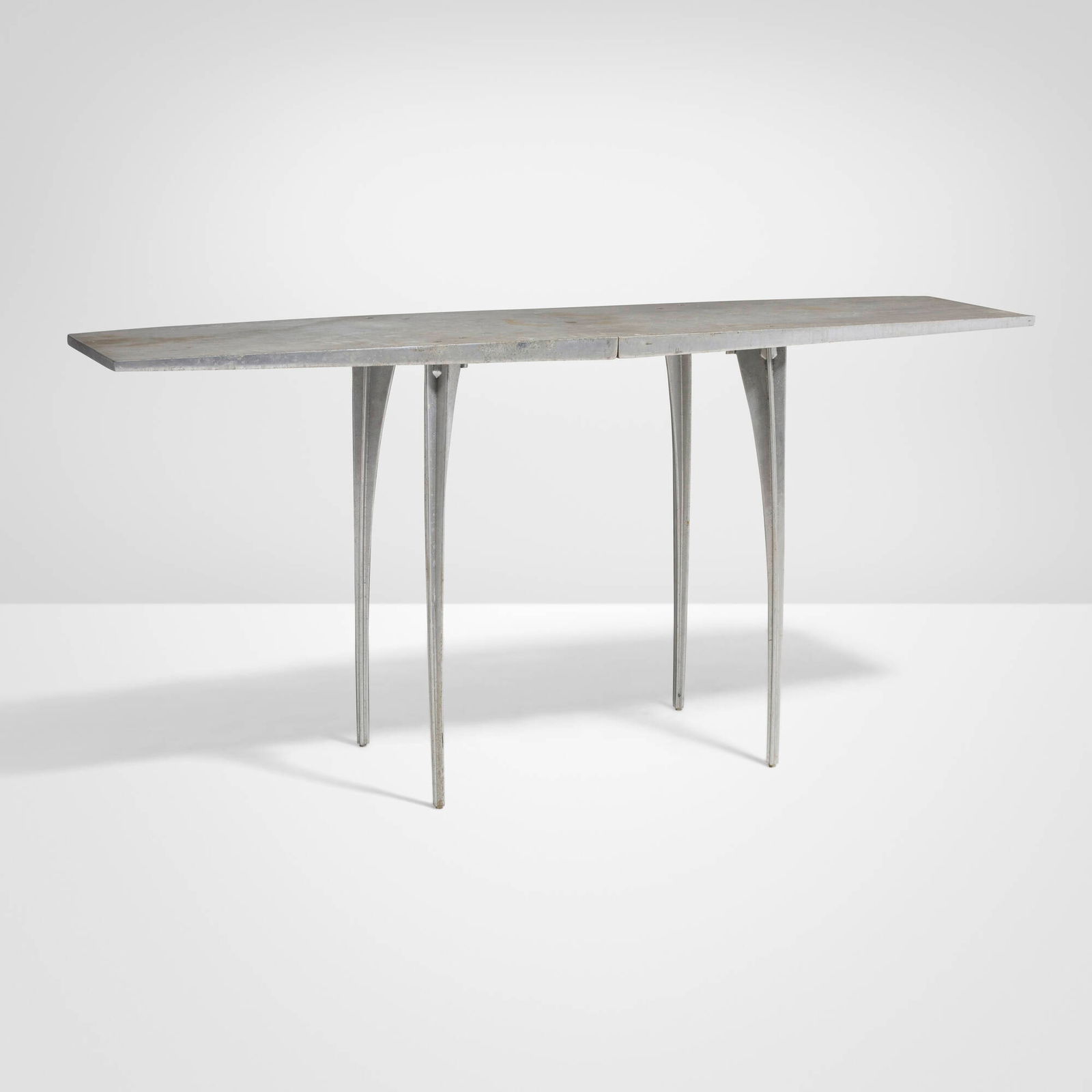 Robert Josten, Console table: Robert Josten Console table Robert Josten and AssociatesUSA, c. 1975cast aluminum 29.75 h x 63.25 w x 17.5 d in (76 x 161 x 44 cm) Provenance: JF Chen, Los Angeles | Acq